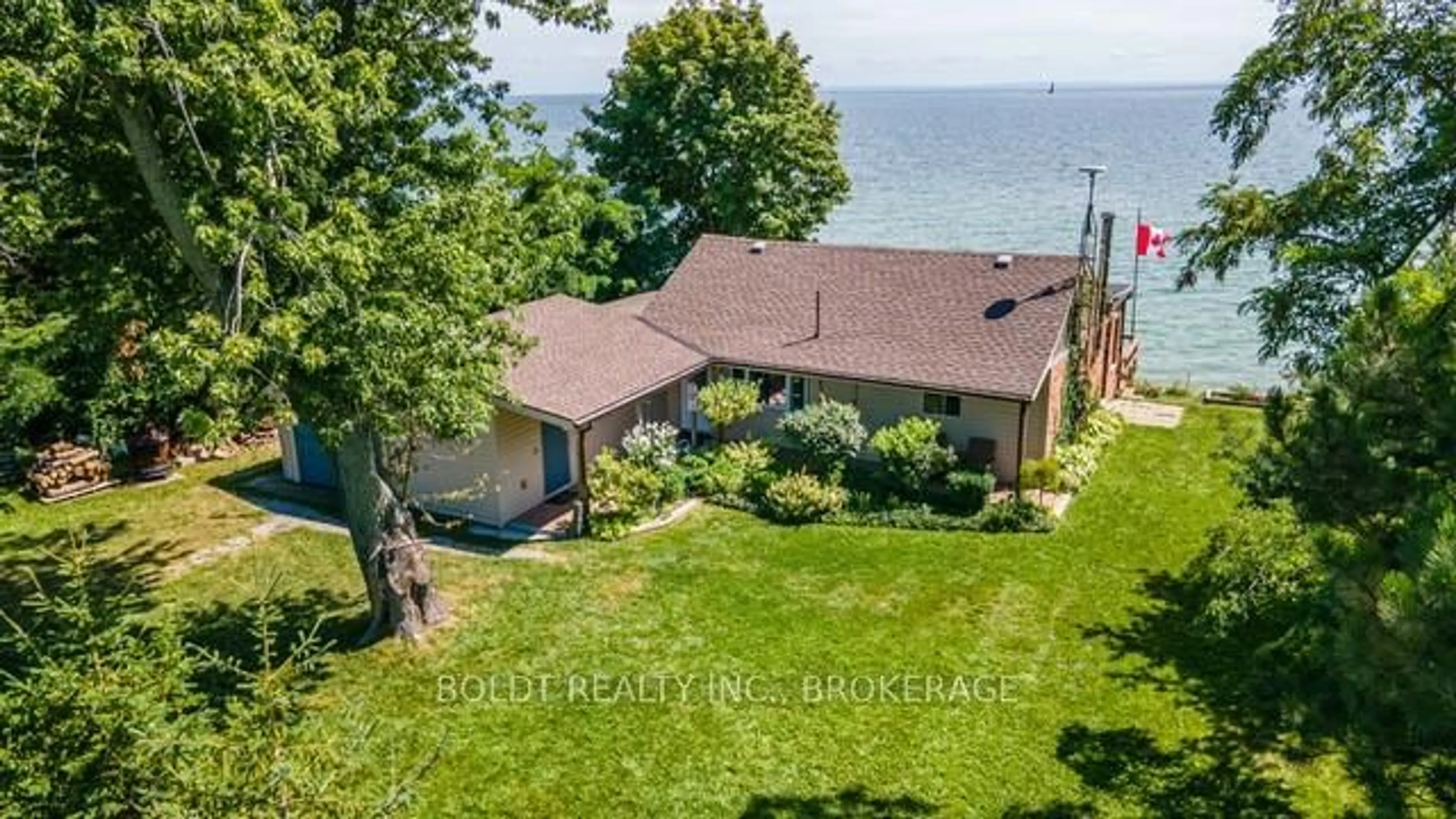 A pic from outside/outdoor area/front of a property/back of a property/a pic from drone, water/lake/river/ocean view for 47 Gull Line, Haldimand Ontario N0A 1K0