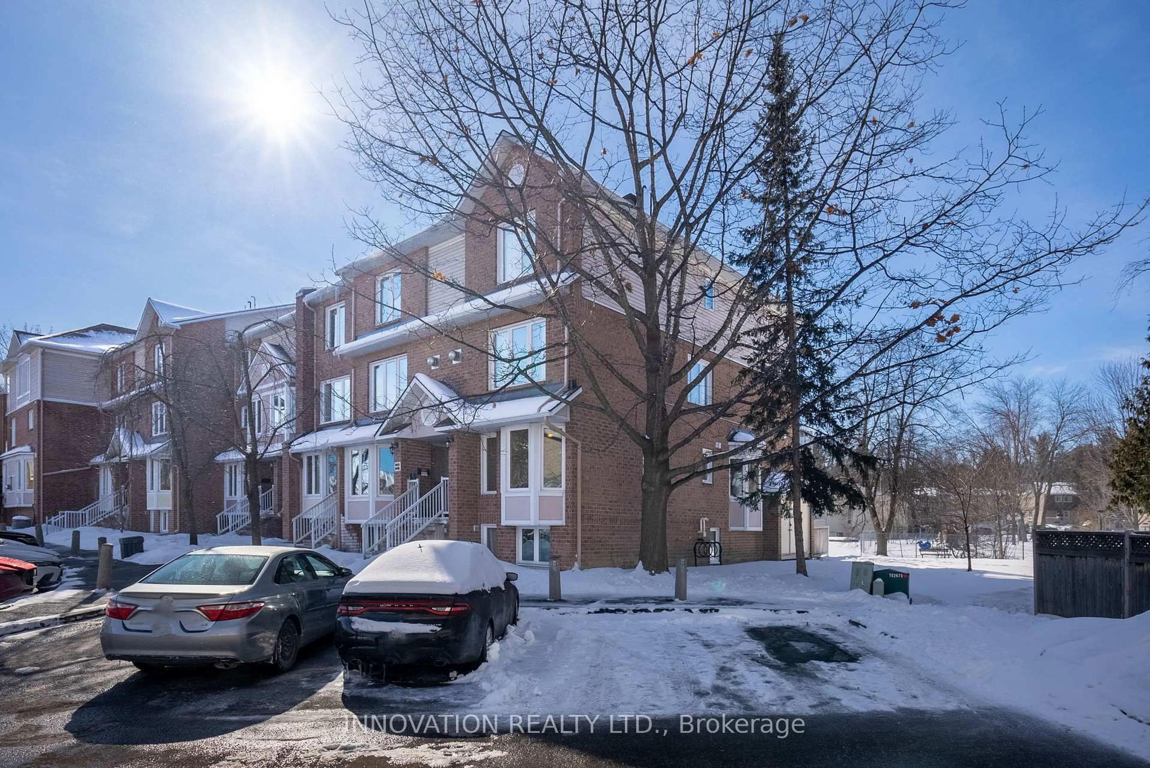 A pic from outside/outdoor area/front of a property/back of a property/a pic from drone, street for 1657 Locksley Lane #9, Ottawa Ontario K1J 1B6