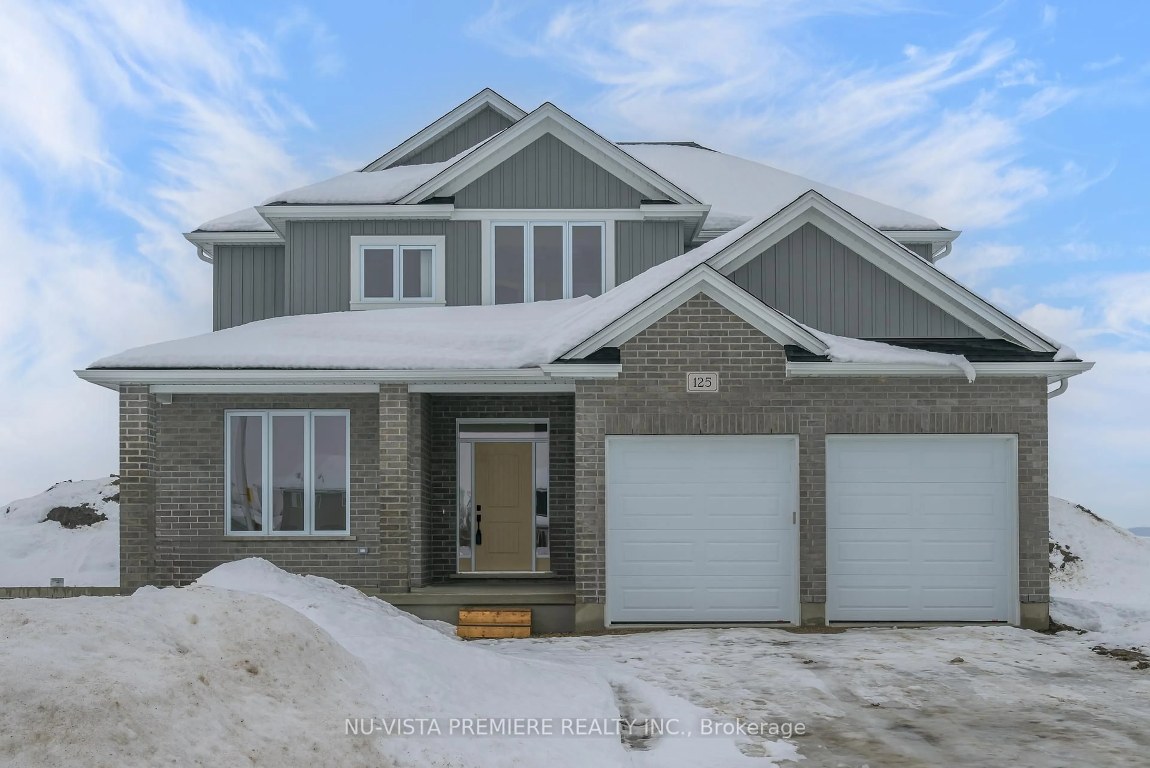 Home with brick exterior material, street for 125 Watts Dr, Lucan Biddulph Ontario N0M 2J0