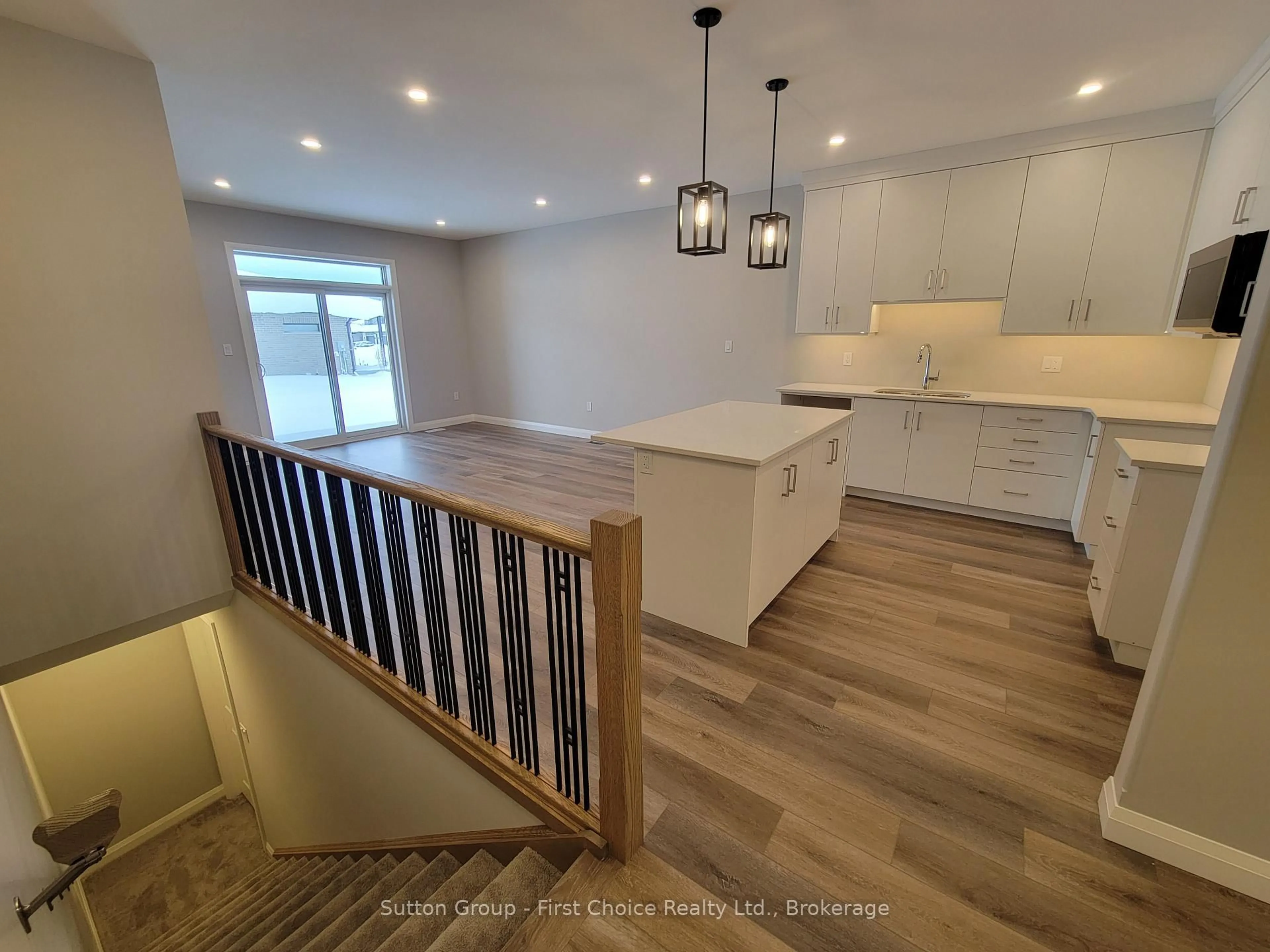 Open concept kitchen, wood/laminate floor for 119 ROWE Ave, South Huron Ontario N0M 1S1