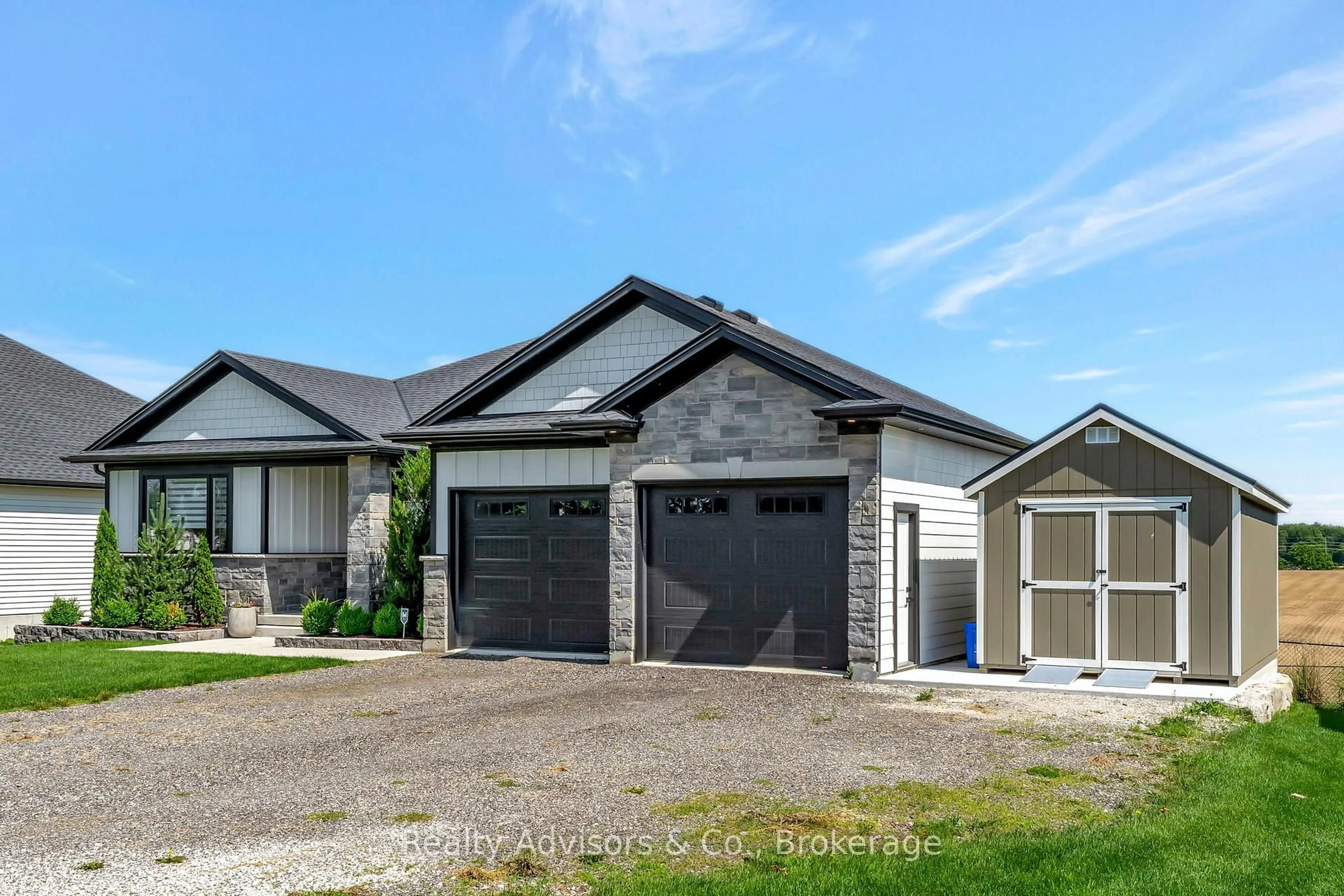 Home with vinyl exterior material, street for 56532 Heritage Line, Bayham Ontario N0J 1Y0