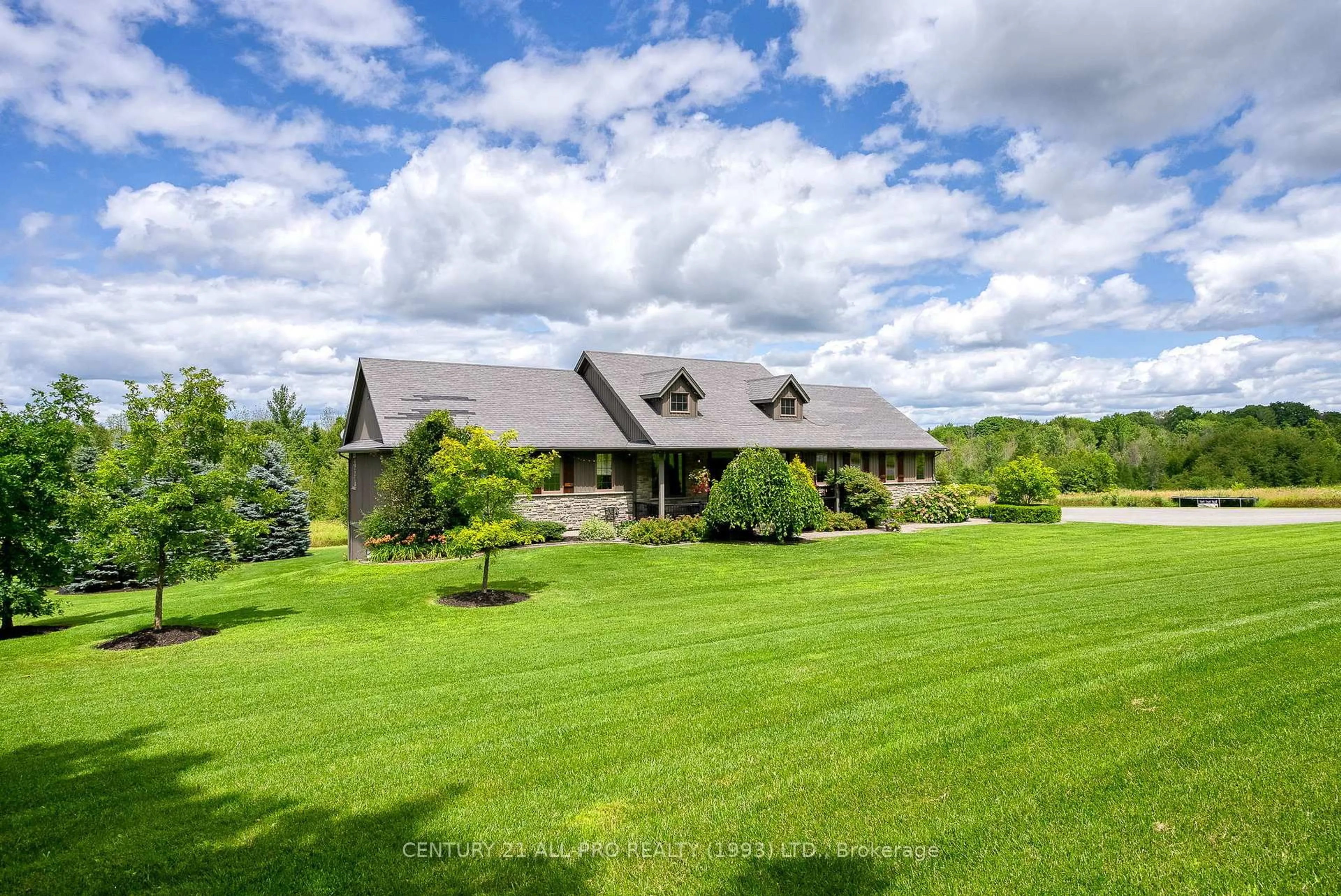 A pic from outside/outdoor area/front of a property/back of a property/a pic from drone, mountain view for 2300 Victoria Rd, Prince Edward County Ontario K0K 1L0