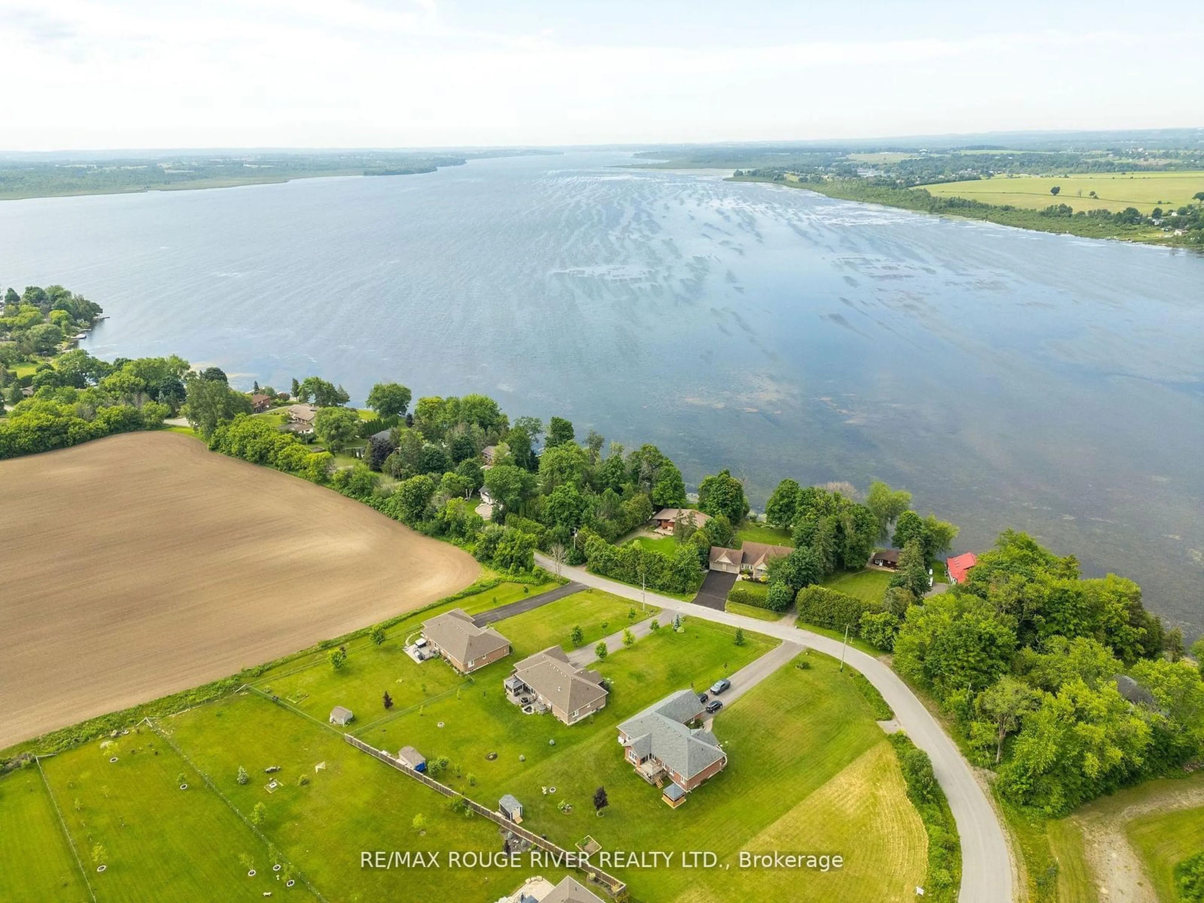 A pic from outside/outdoor area/front of a property/back of a property/a pic from drone, water/lake/river/ocean view for 59 Gilson St, Kawartha Lakes Ontario K0M 2C0