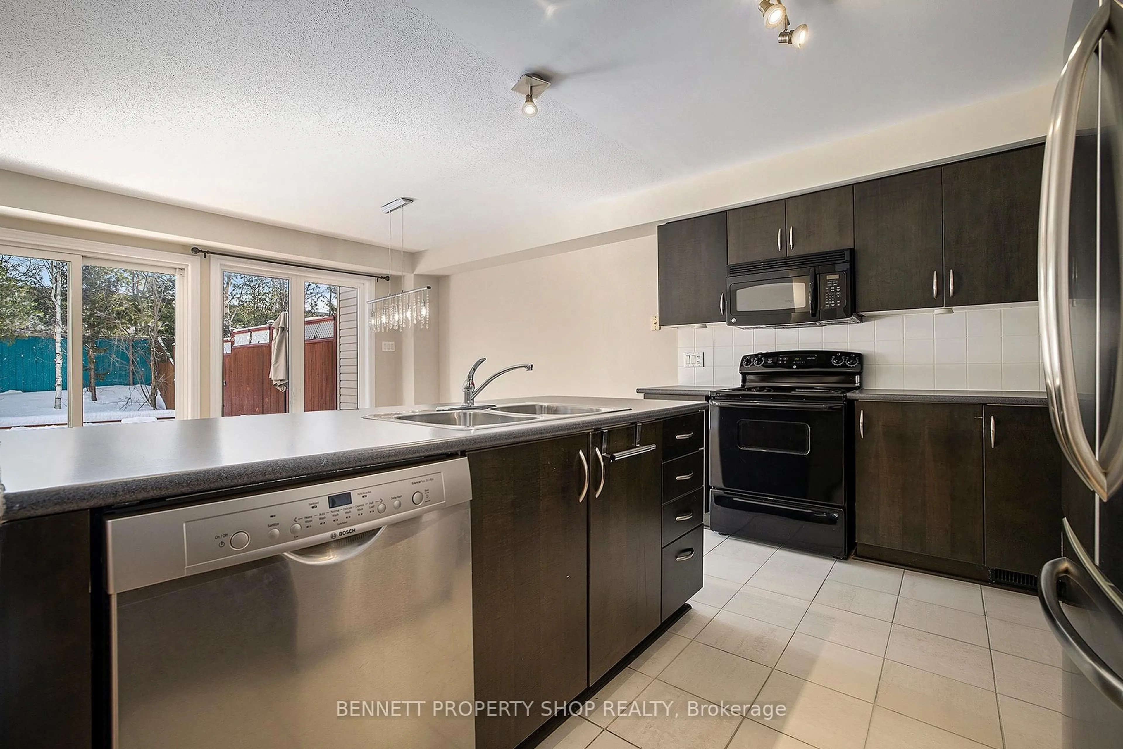 Standard kitchen, ceramic/tile floor for 107 Bandelier Way, Ottawa Ontario K2S 0C3