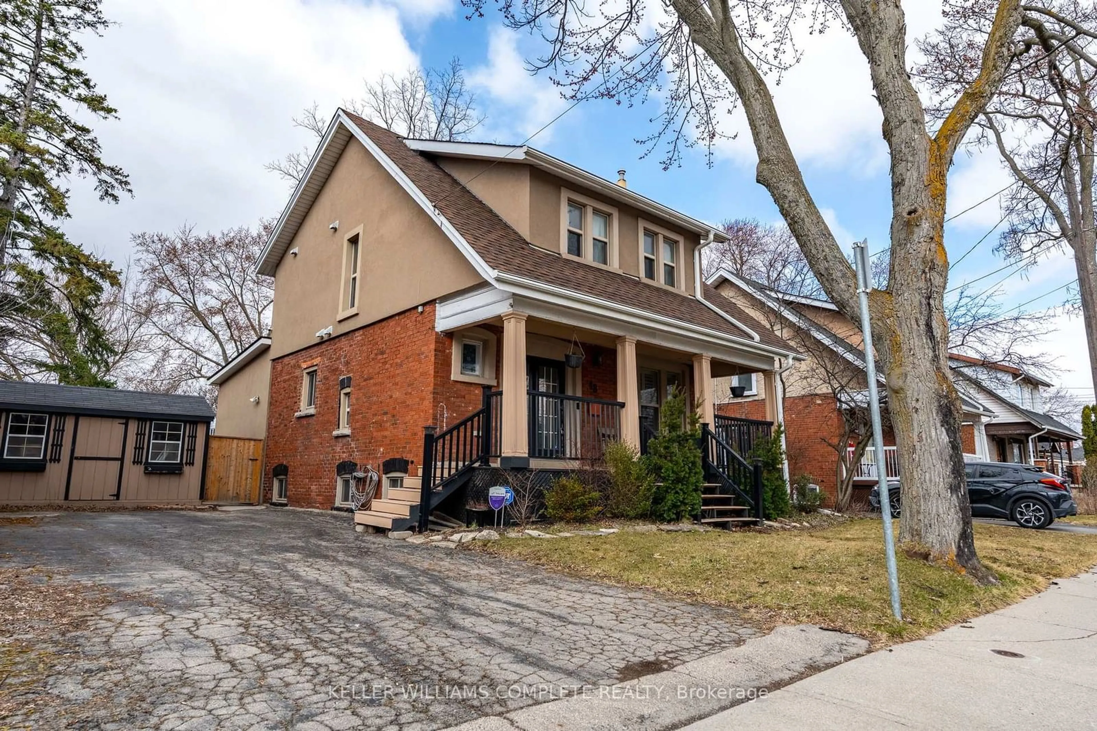 Home with brick exterior material, street for 48 West 3rd St, Hamilton Ontario L9C 3J9