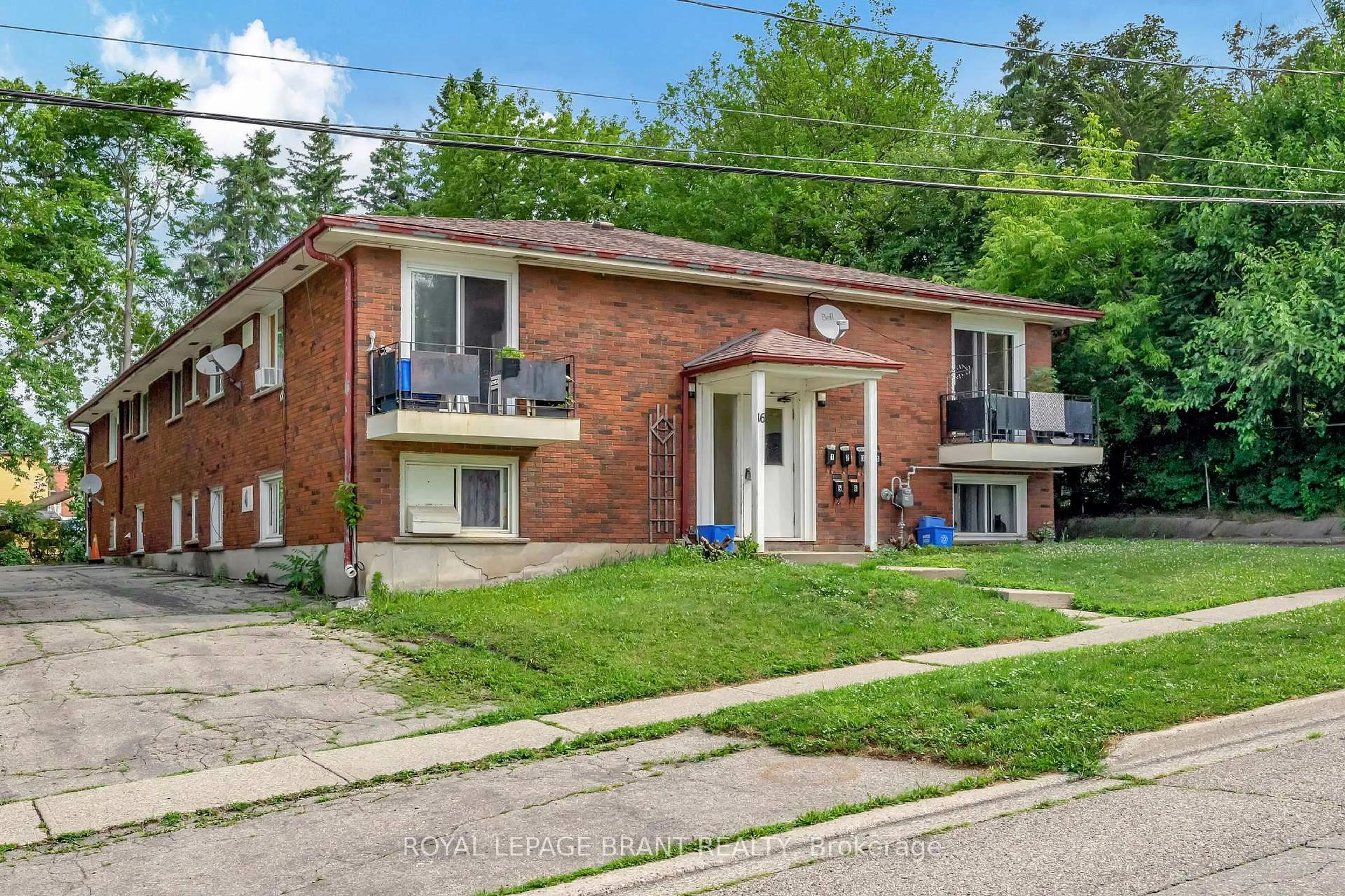 Home with brick exterior material, street for 16 East Ave, Brantford Ontario N3S 3L1