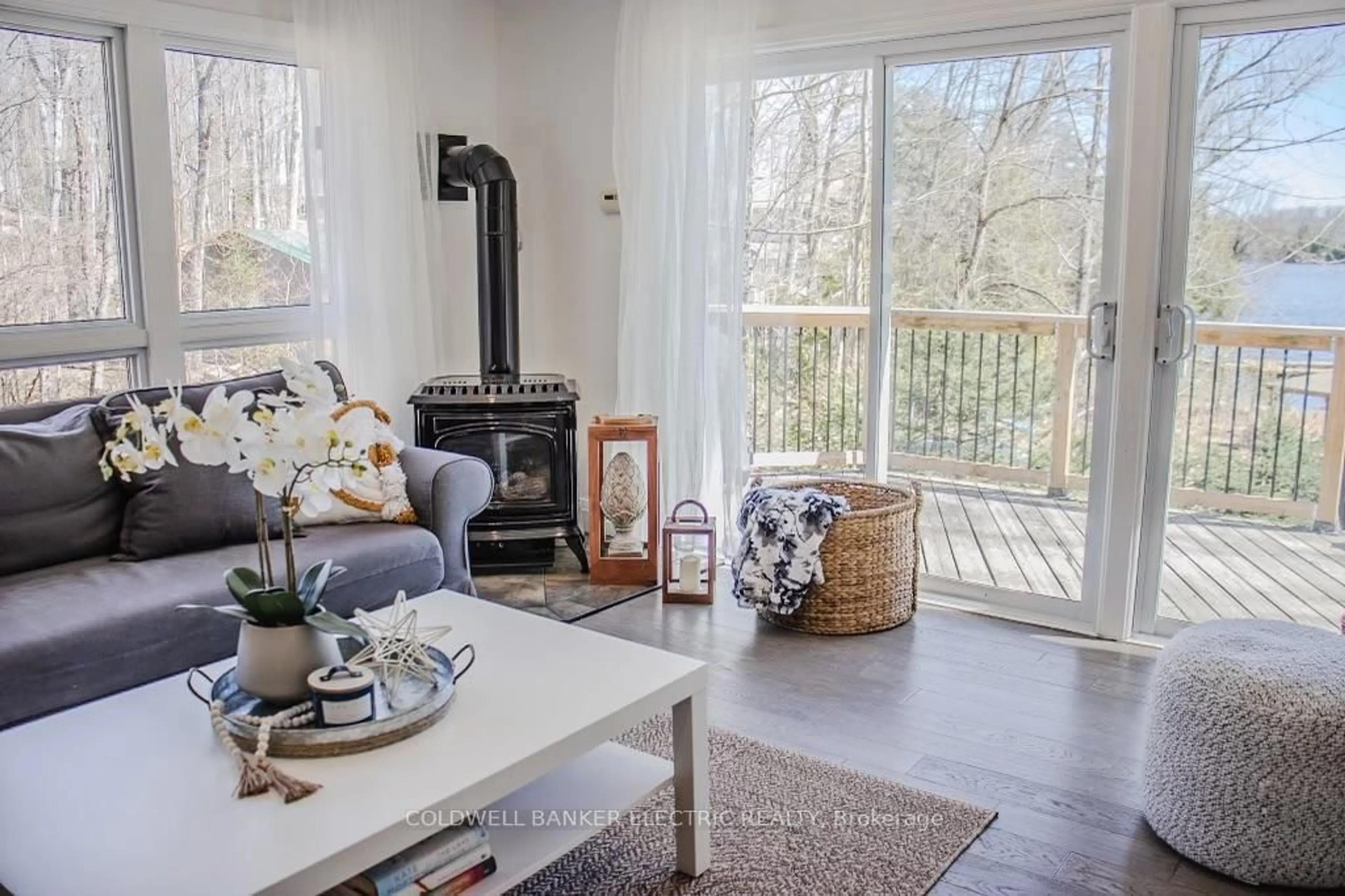 Living room with furniture, wood/laminate floor for 18 Bay View Lane, Hastings Ontario K0L 1W0