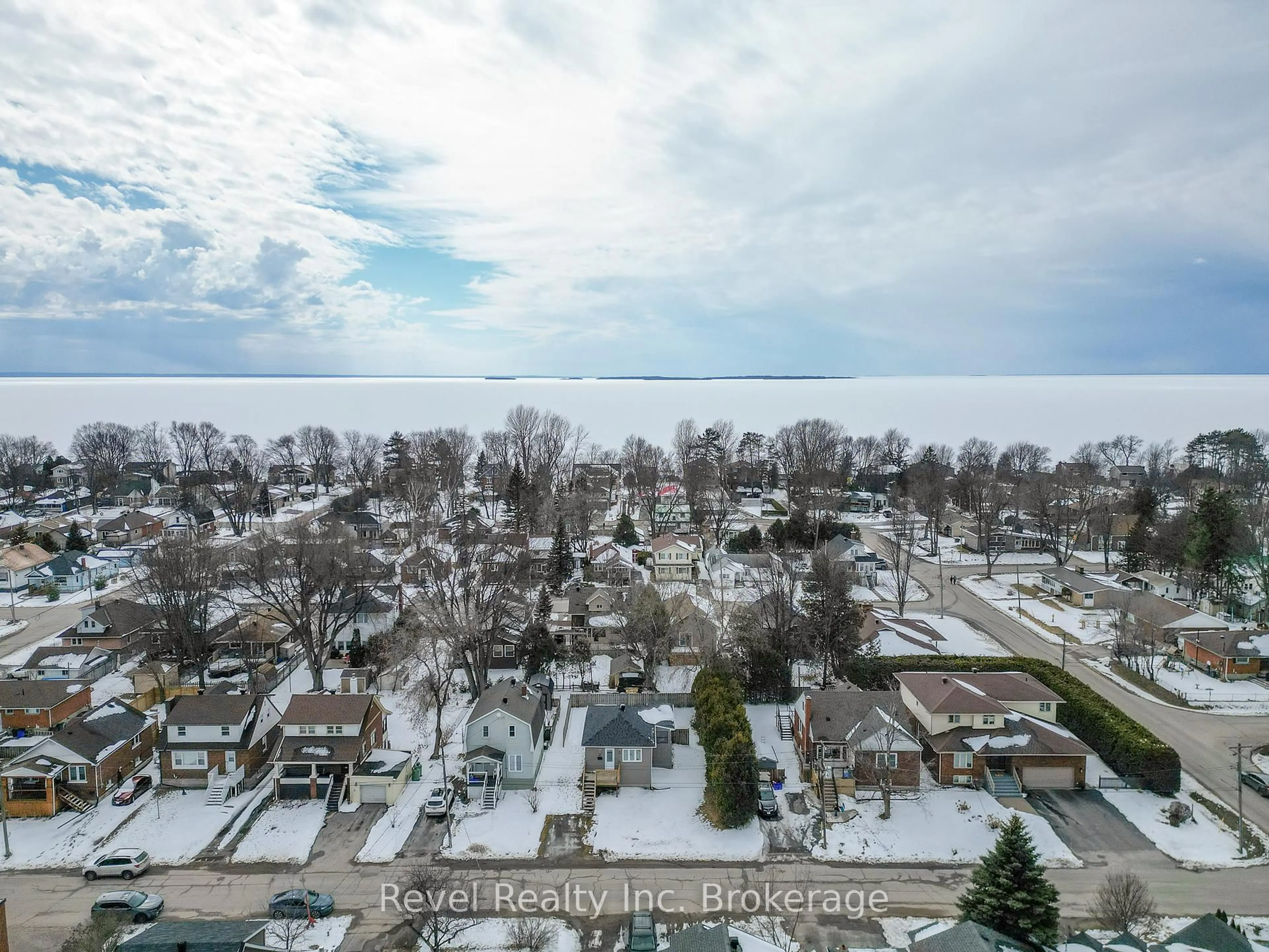 A pic from outside/outdoor area/front of a property/back of a property/a pic from drone, water/lake/river/ocean view for 57 Nelson Ave, North Bay Ontario P1A 1Z7