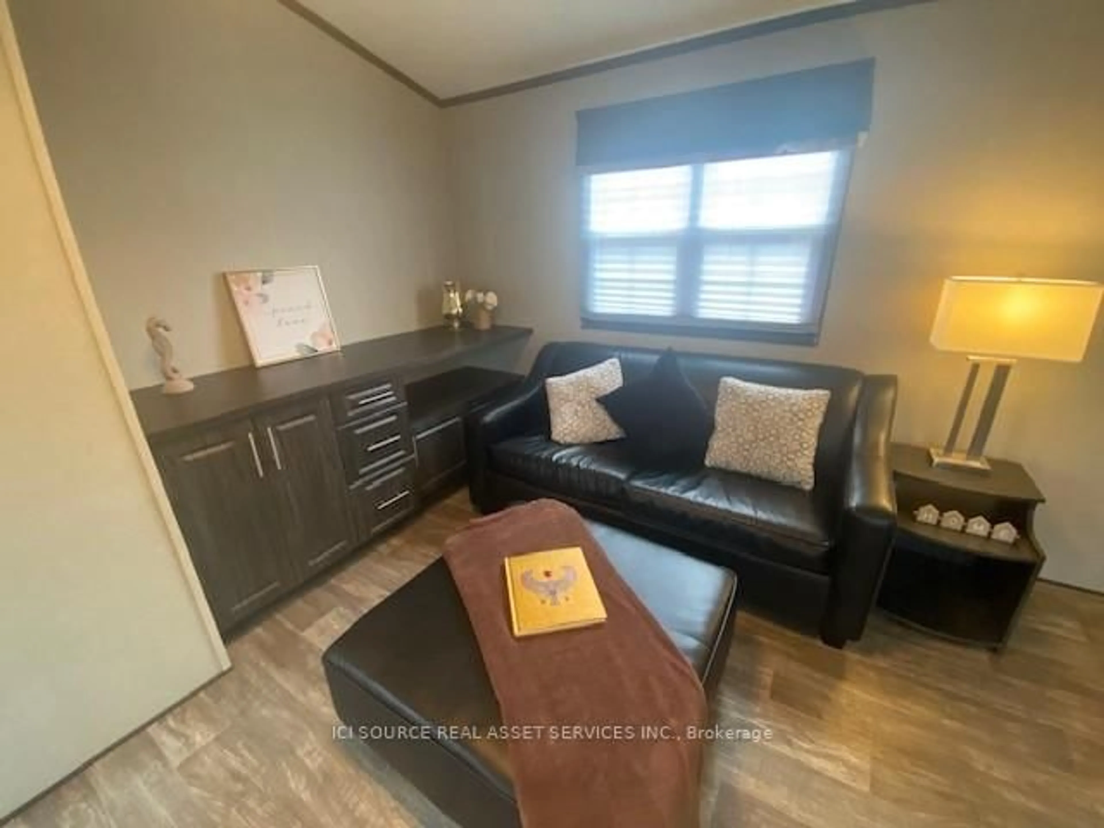 Living room with furniture, wood/laminate floor for 7100 County Road 18 N/A #1B, Alnwick/Haldimand Ontario K0K 2X0