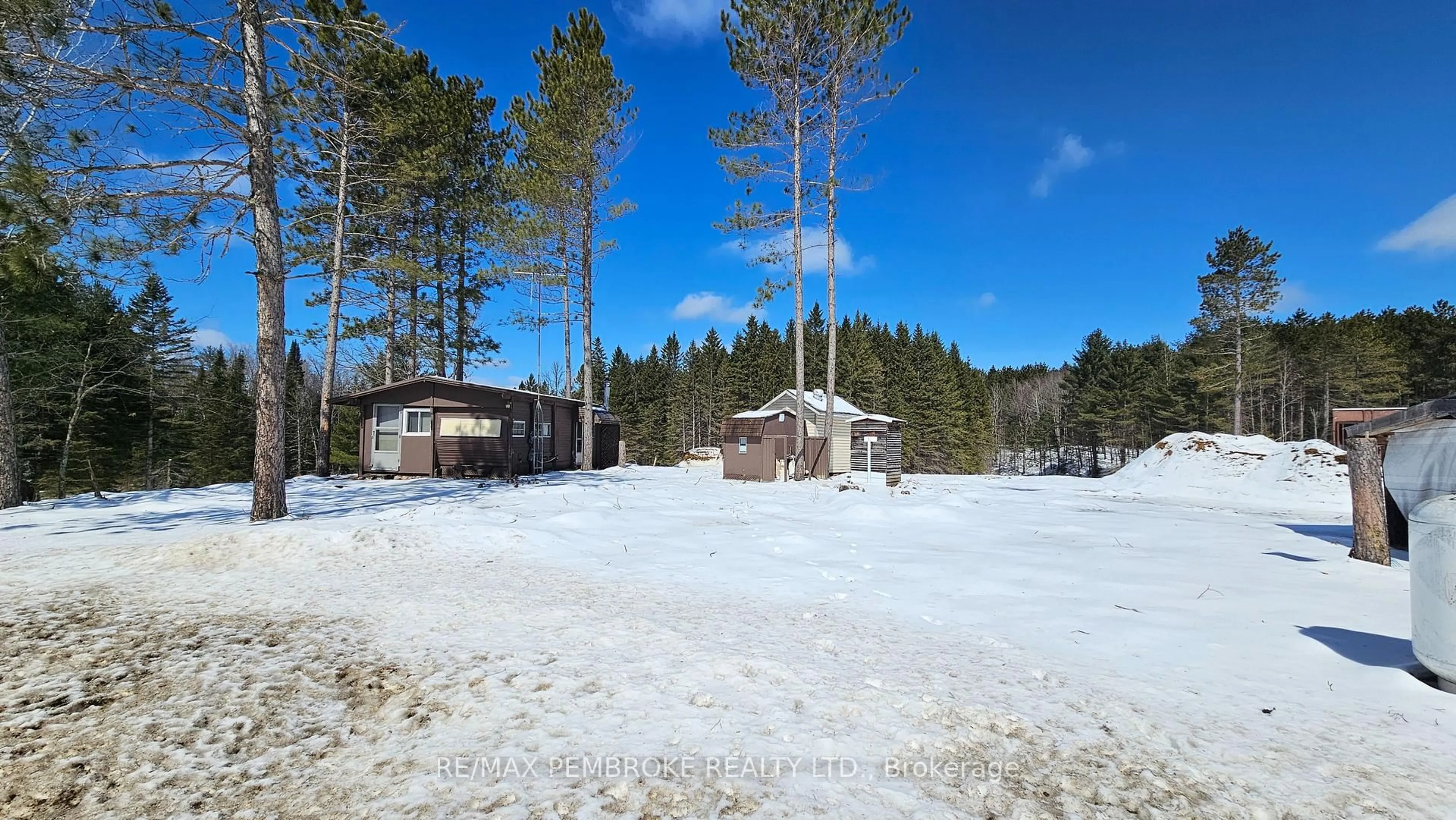 A pic from outside/outdoor area/front of a property/back of a property/a pic from drone, forest/trees view for 4293 ROUND LAKE Rd, Killaloe Ontario K0J 2A0
