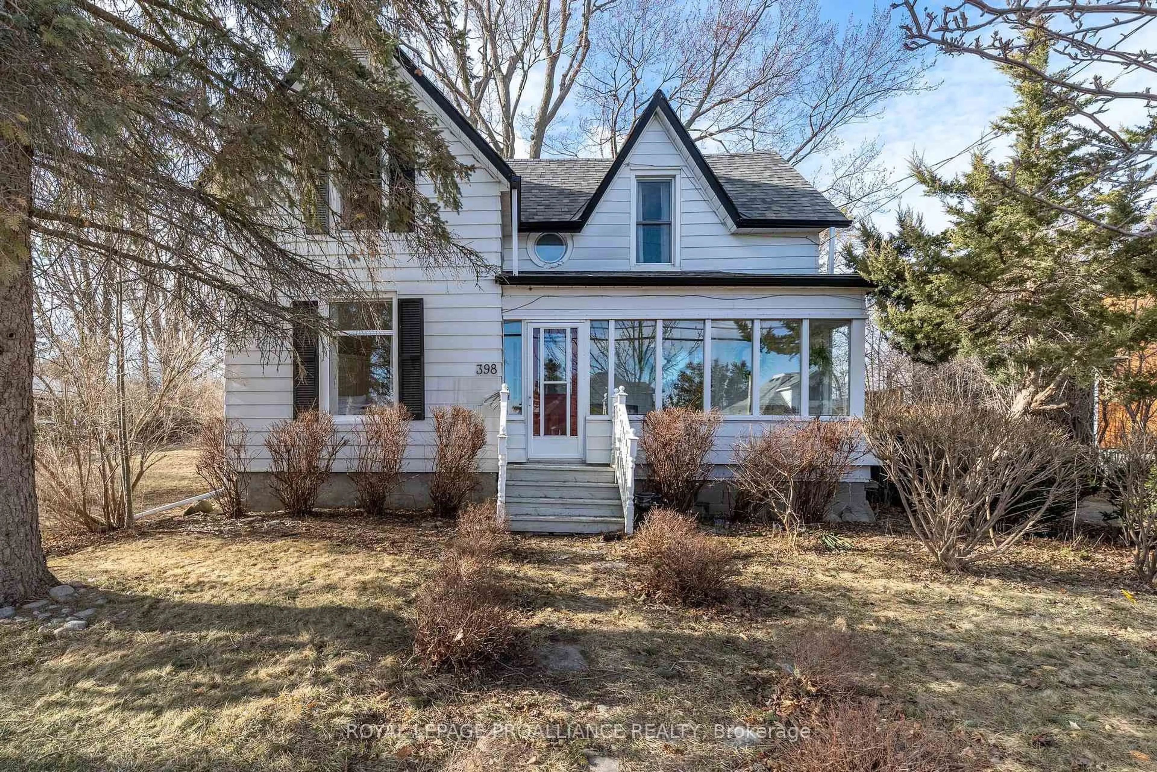 Home with vinyl exterior material, street for 398 Wellington Main St, Prince Edward County Ontario K0K 3L0