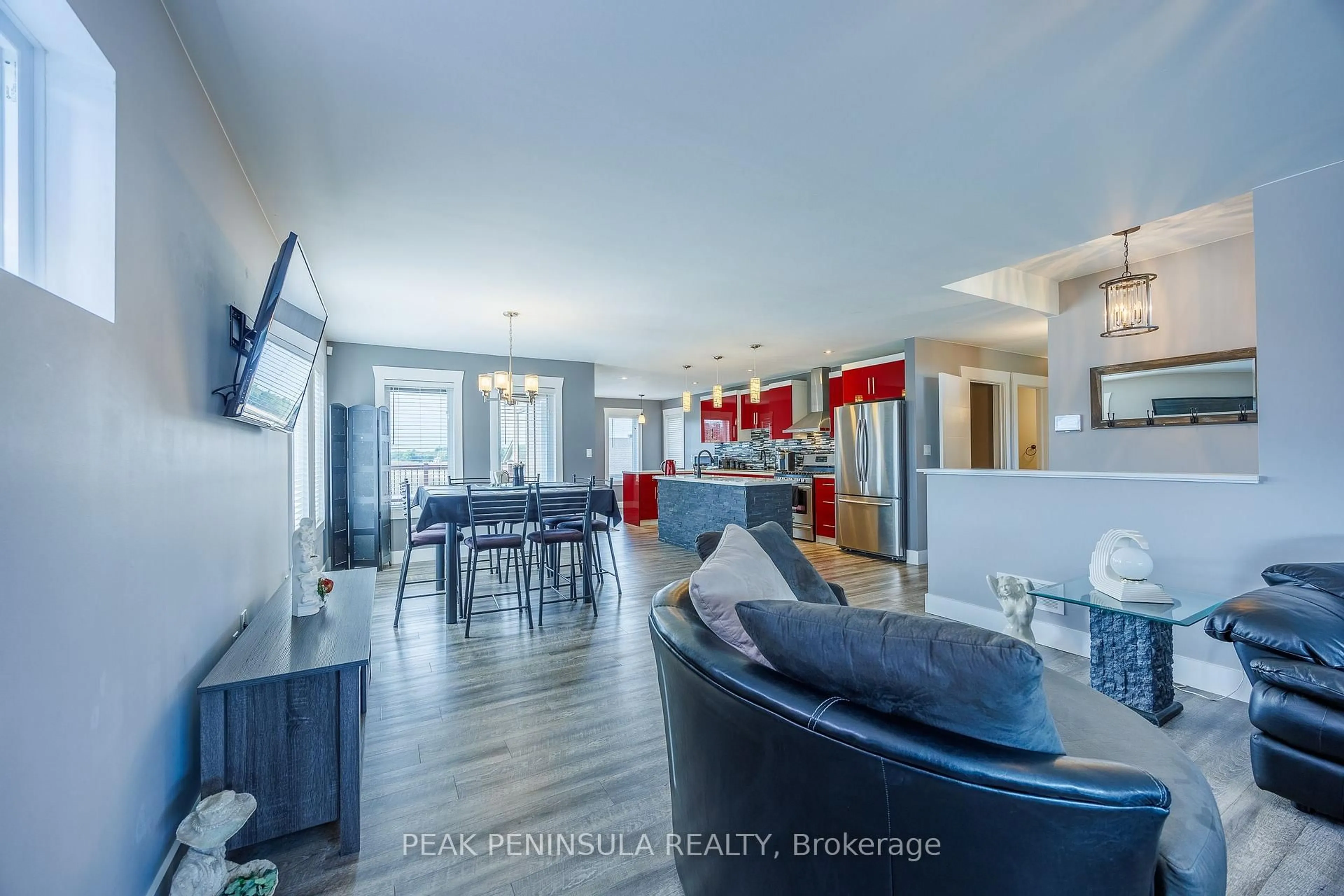 Open concept kitchen, wood/laminate floor for 8383 Sandytown Rd, Bayham Ontario N0J 1Y0