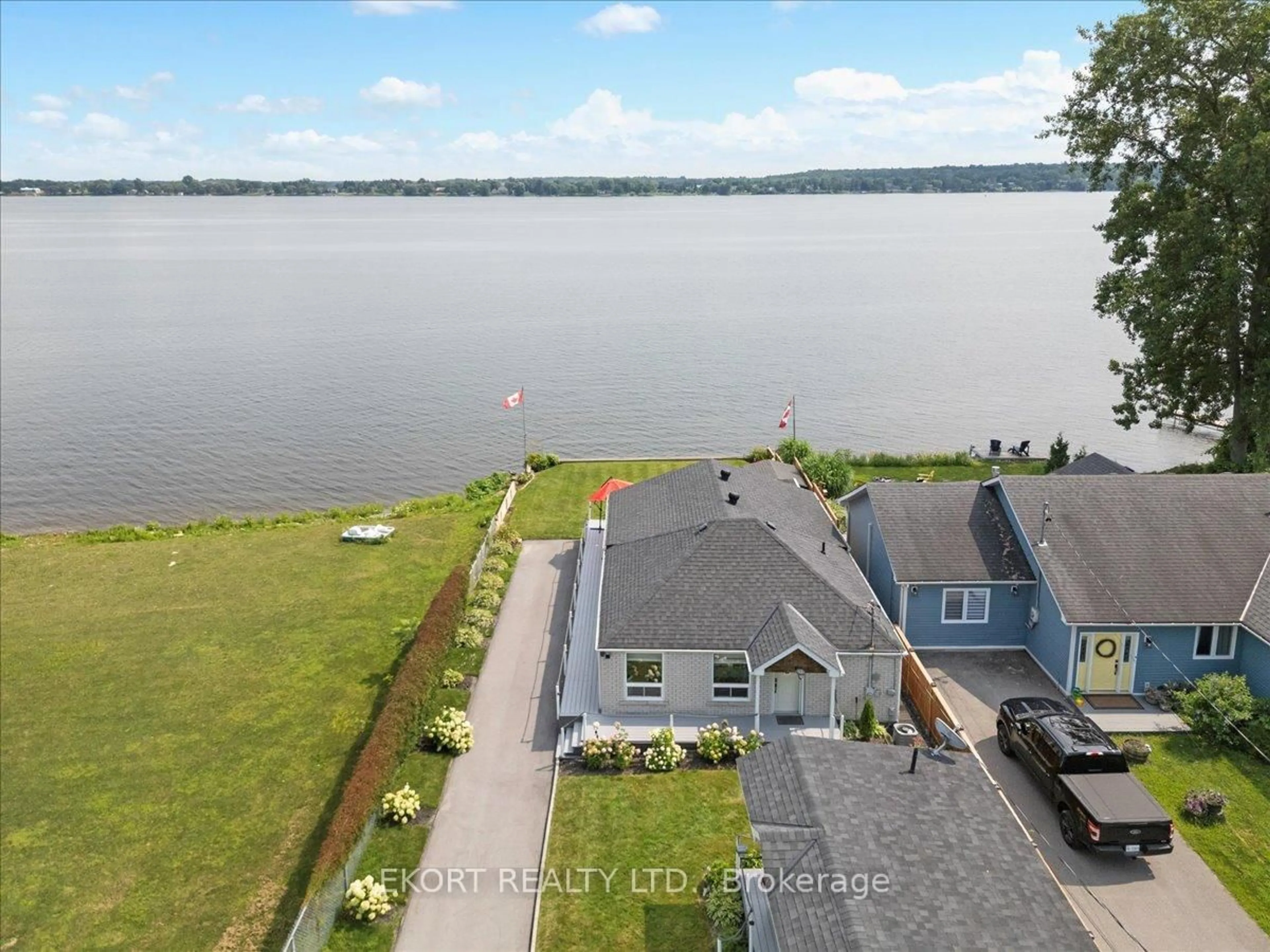 A pic from outside/outdoor area/front of a property/back of a property/a pic from drone, water/lake/river/ocean view for 1718 Old Highway 2, Quinte West Ontario K8N 4Z2