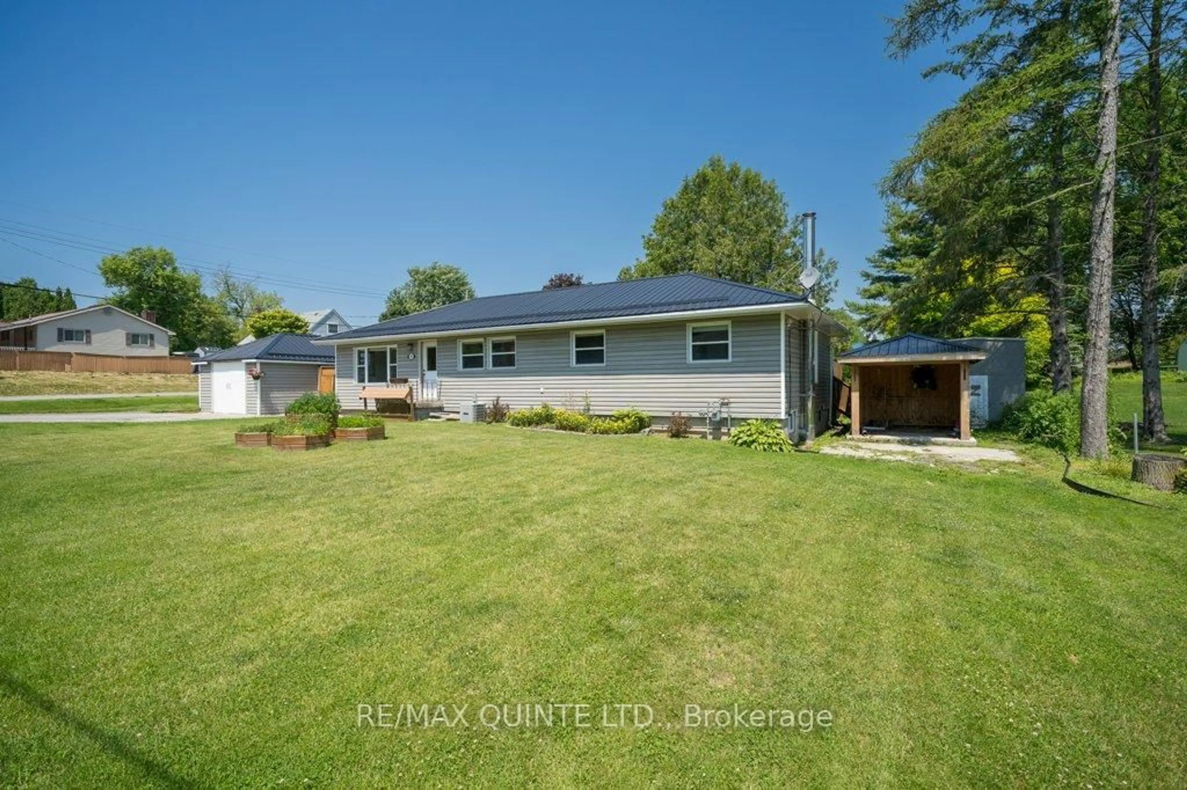 A pic from outside/outdoor area/front of a property/back of a property/a pic from drone, water/lake/river/ocean view for 348 River St, Tweed Ontario K0K 3J0