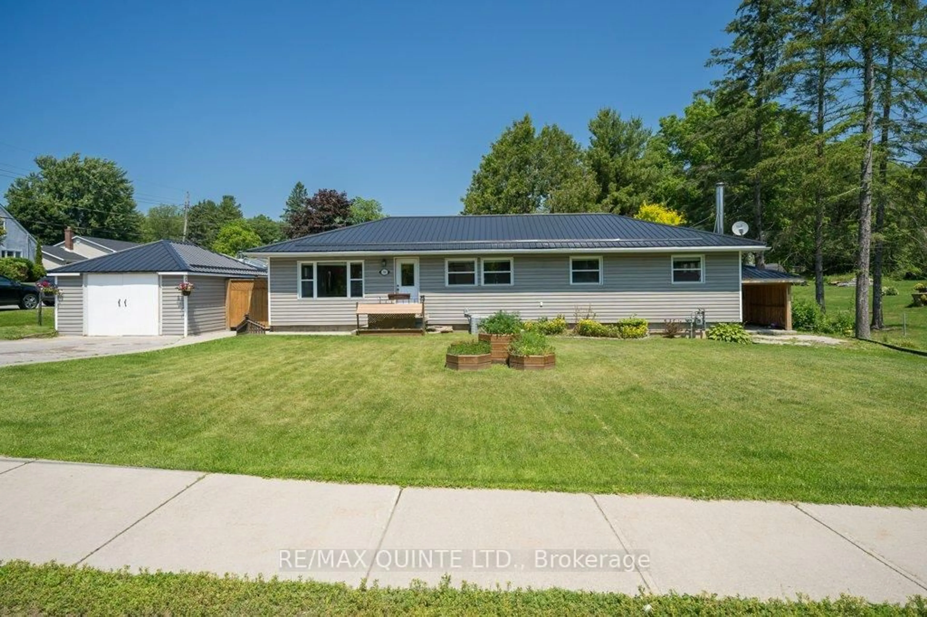 Home with vinyl exterior material, street for 348 River St, Tweed Ontario K0K 3J0
