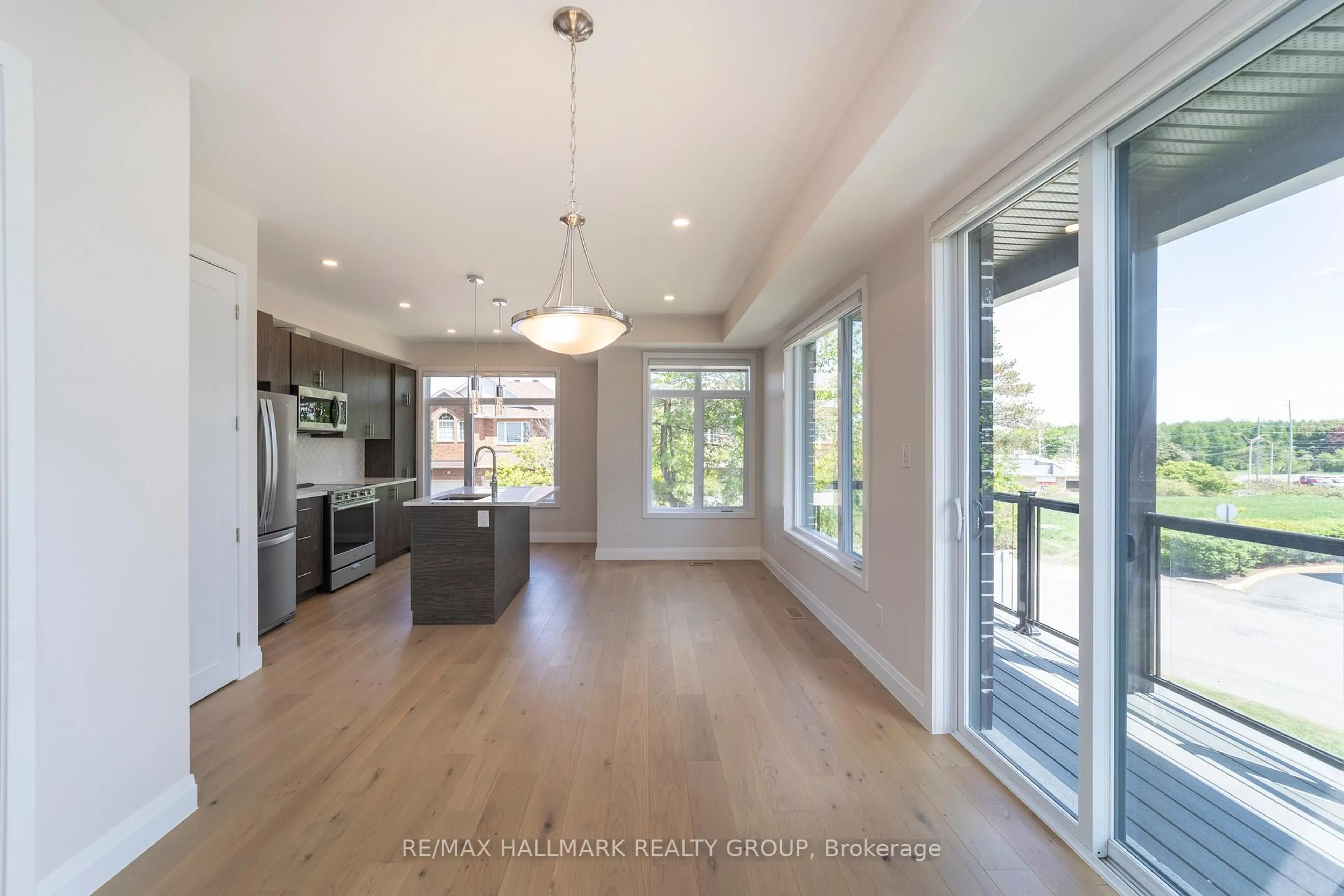 Open concept kitchen, wood/laminate floor for 800 Star N/A, Ottawa Ontario K2L 1W2