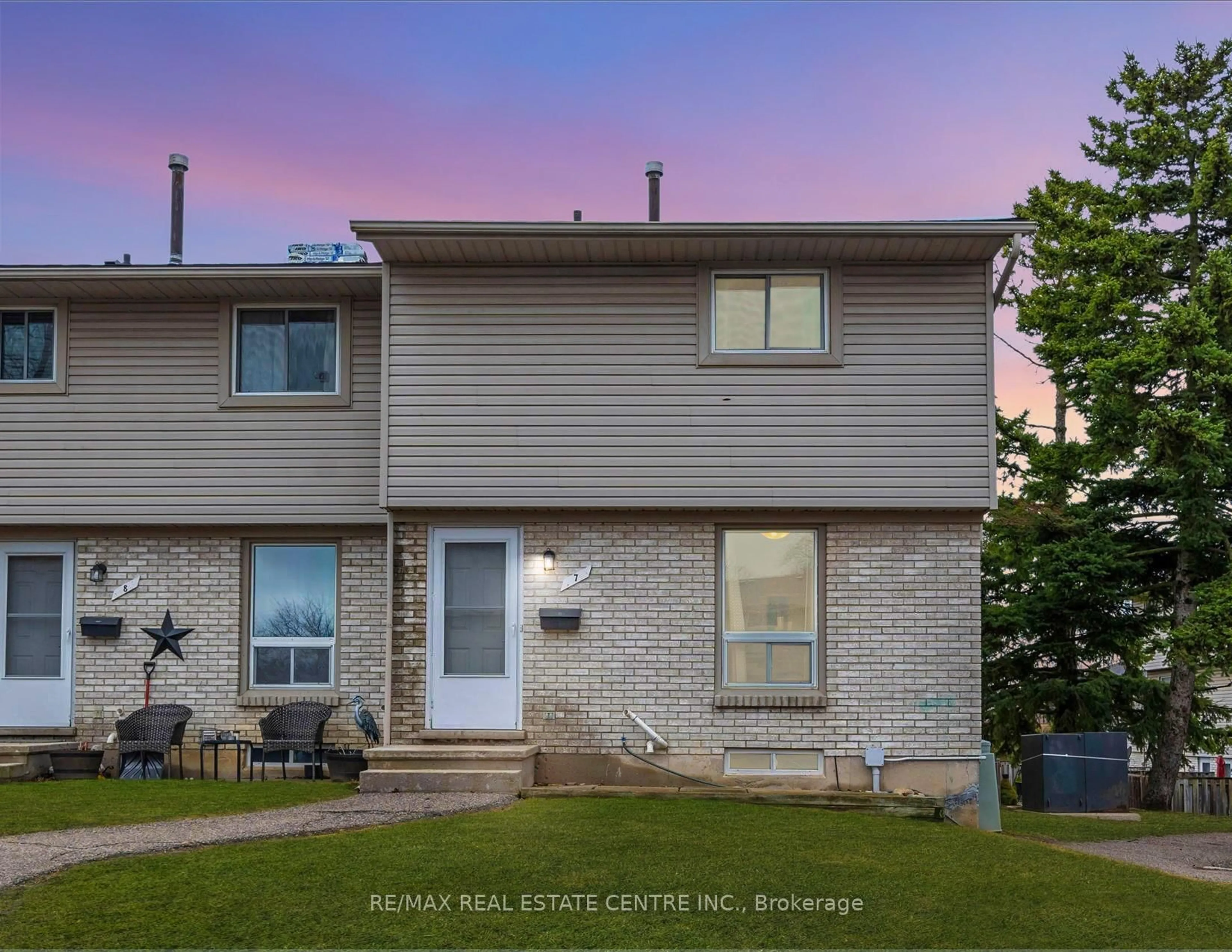 Home with vinyl exterior material, street for 700 Paisley Rd #7, Guelph Ontario N1K 1A3