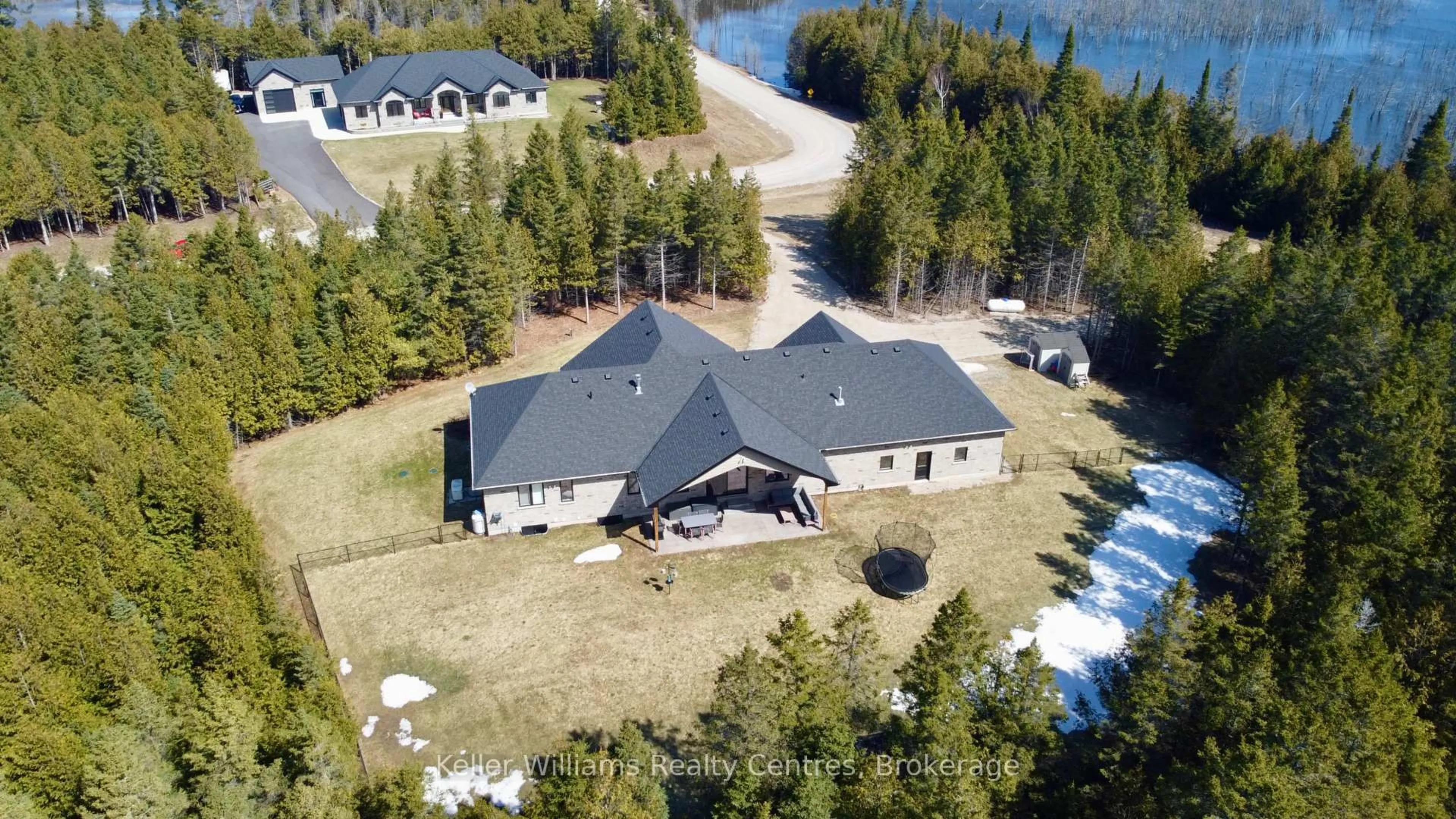 A pic from outside/outdoor area/front of a property/back of a property/a pic from drone, water/lake/river/ocean view for 185 Louise Creek Cres, West Grey Ontario N0G 1S0