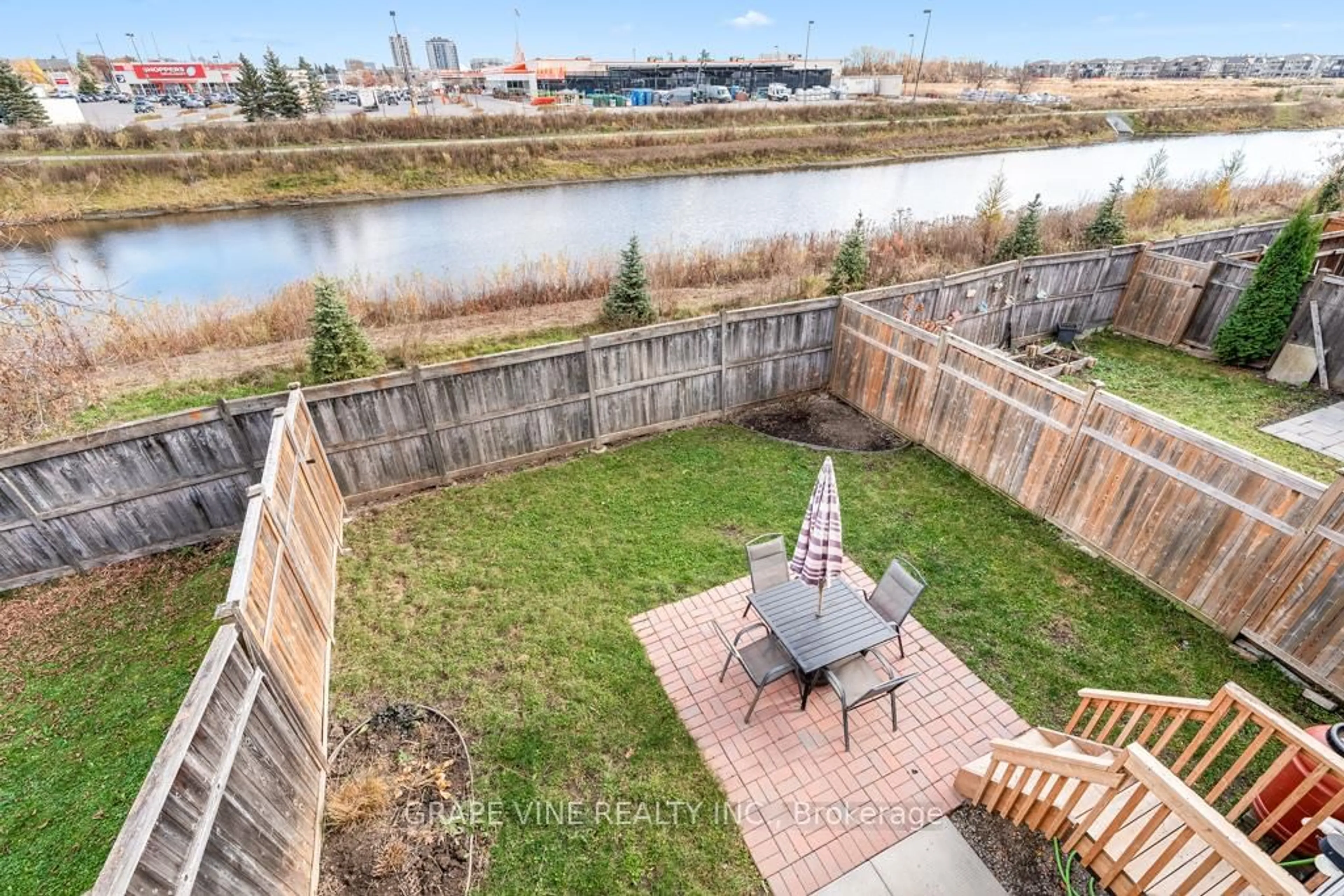 A pic from outside/outdoor area/front of a property/back of a property/a pic from drone, water/lake/river/ocean view for 1601 Haydon Circ, Ottawa Ontario K2J 0K5
