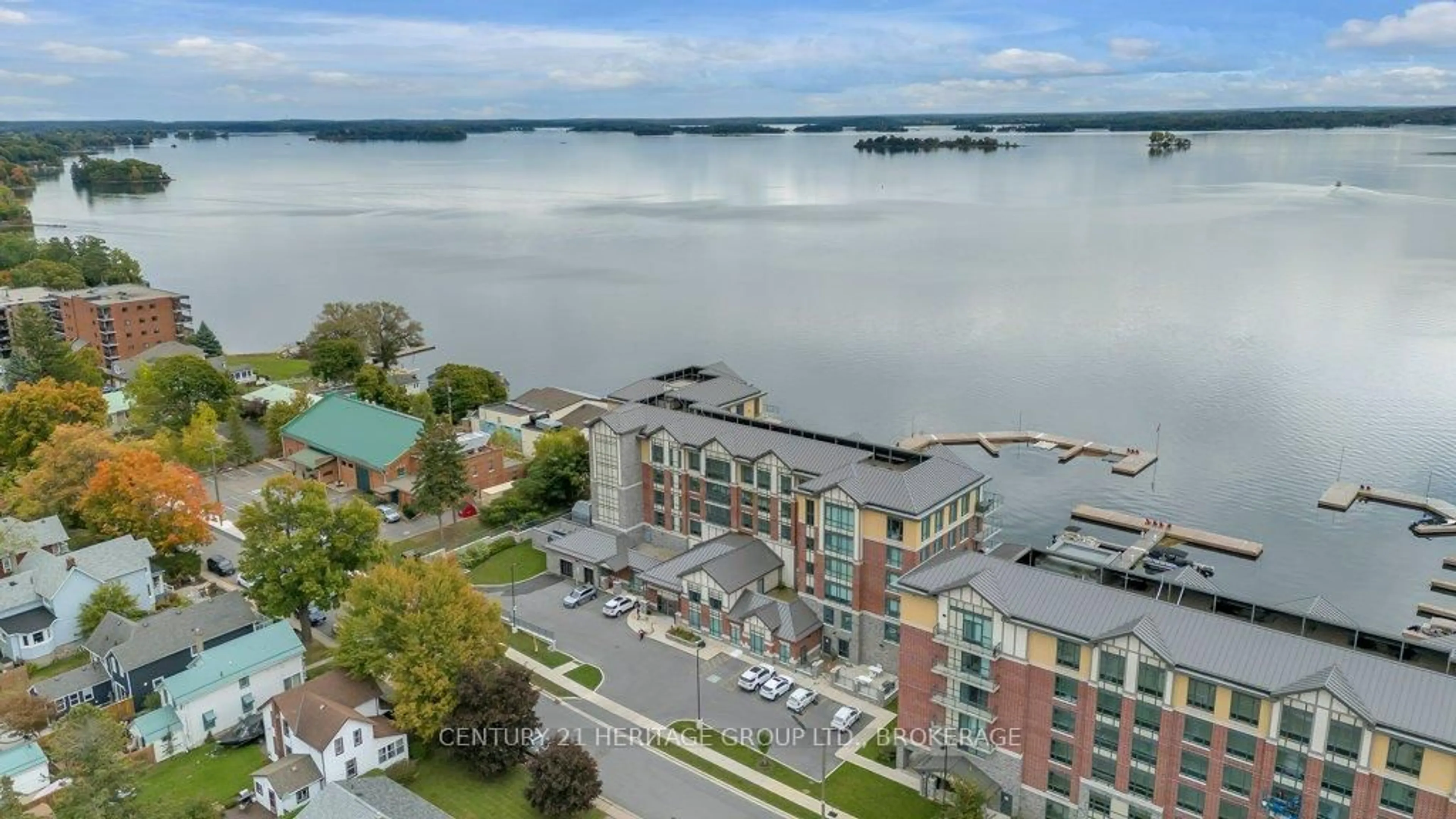 A pic from outside/outdoor area/front of a property/back of a property/a pic from drone, water/lake/river/ocean view for 129 South St #306, Gananoque Ontario K7G 1A1