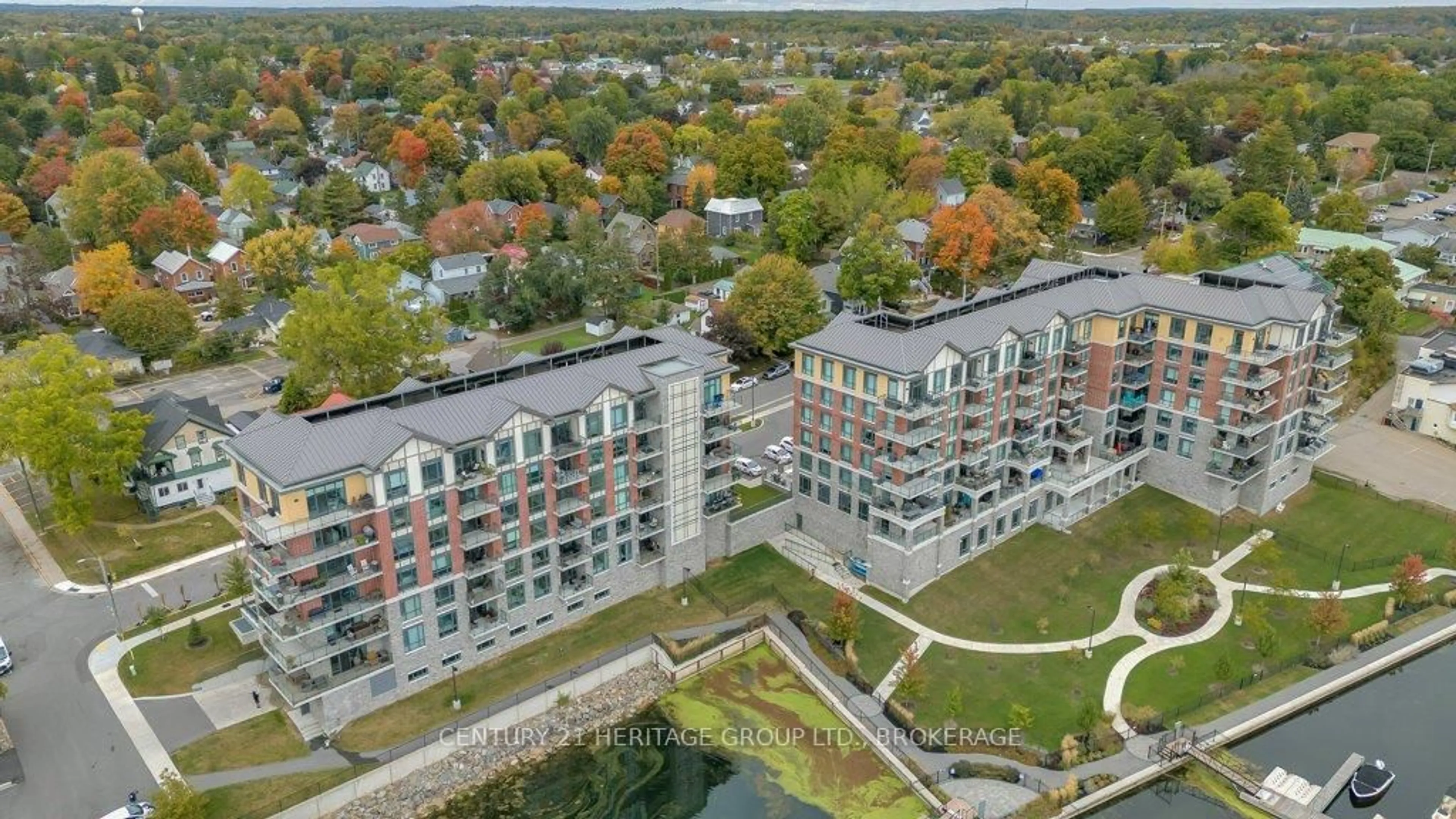 A pic from outside/outdoor area/front of a property/back of a property/a pic from drone, city buildings view from balcony for 129 South St #306, Gananoque Ontario K7G 1A1