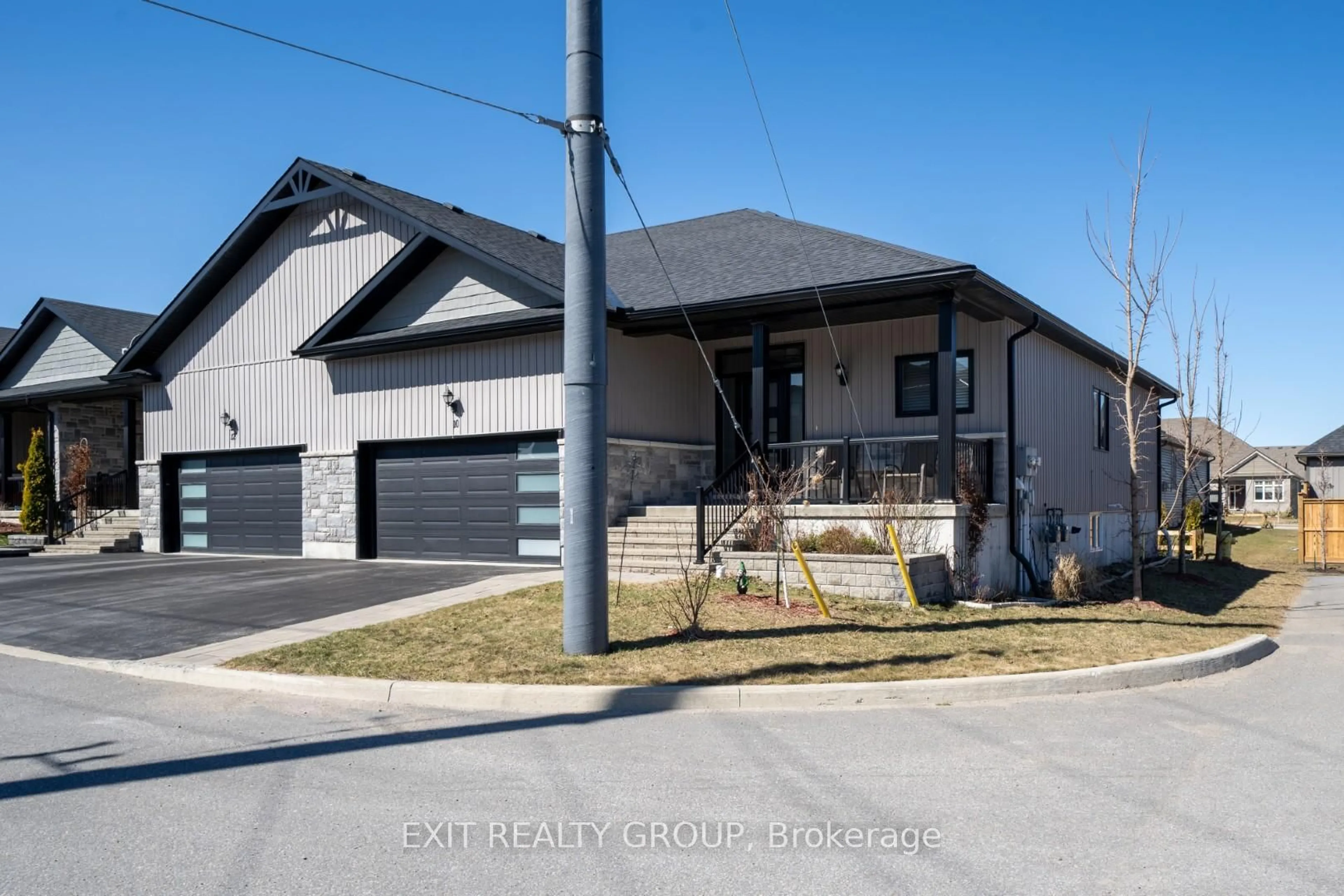 Home with brick exterior material, street for 39 Downes Ave ##10, Prince Edward County Ontario K0K 2T0