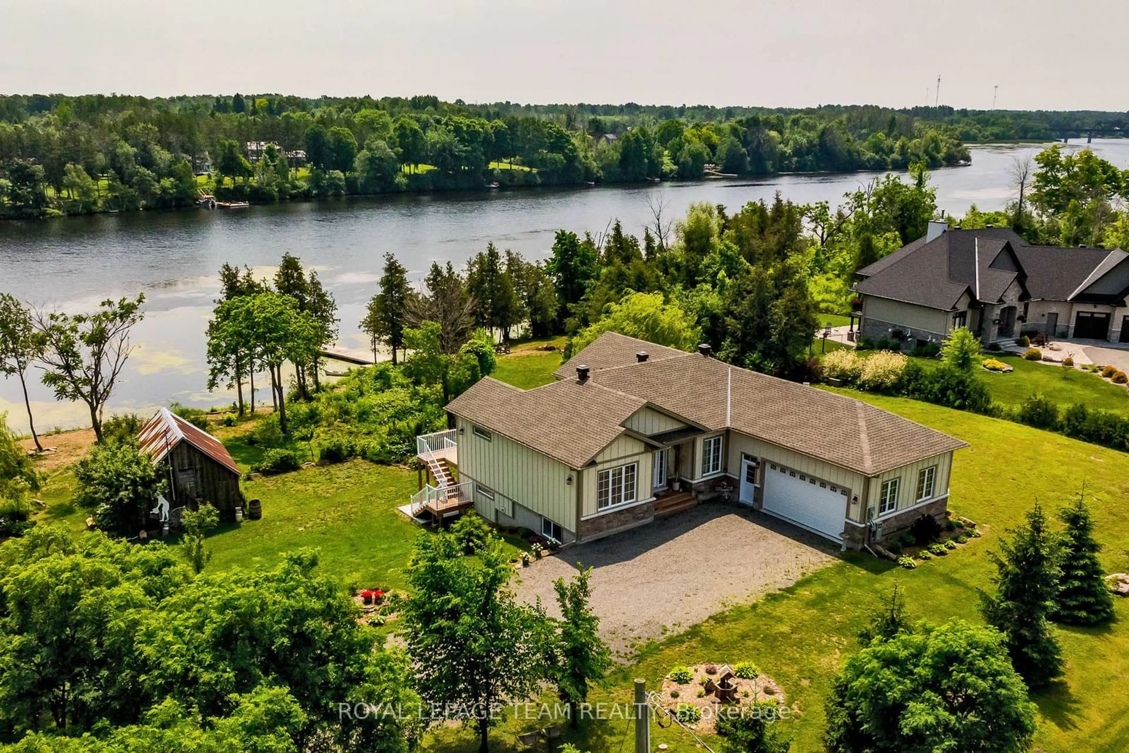 A pic from outside/outdoor area/front of a property/back of a property/a pic from drone, water/lake/river/ocean view for 853 Heritage Dr, Merrickville Ontario K0G 1N0
