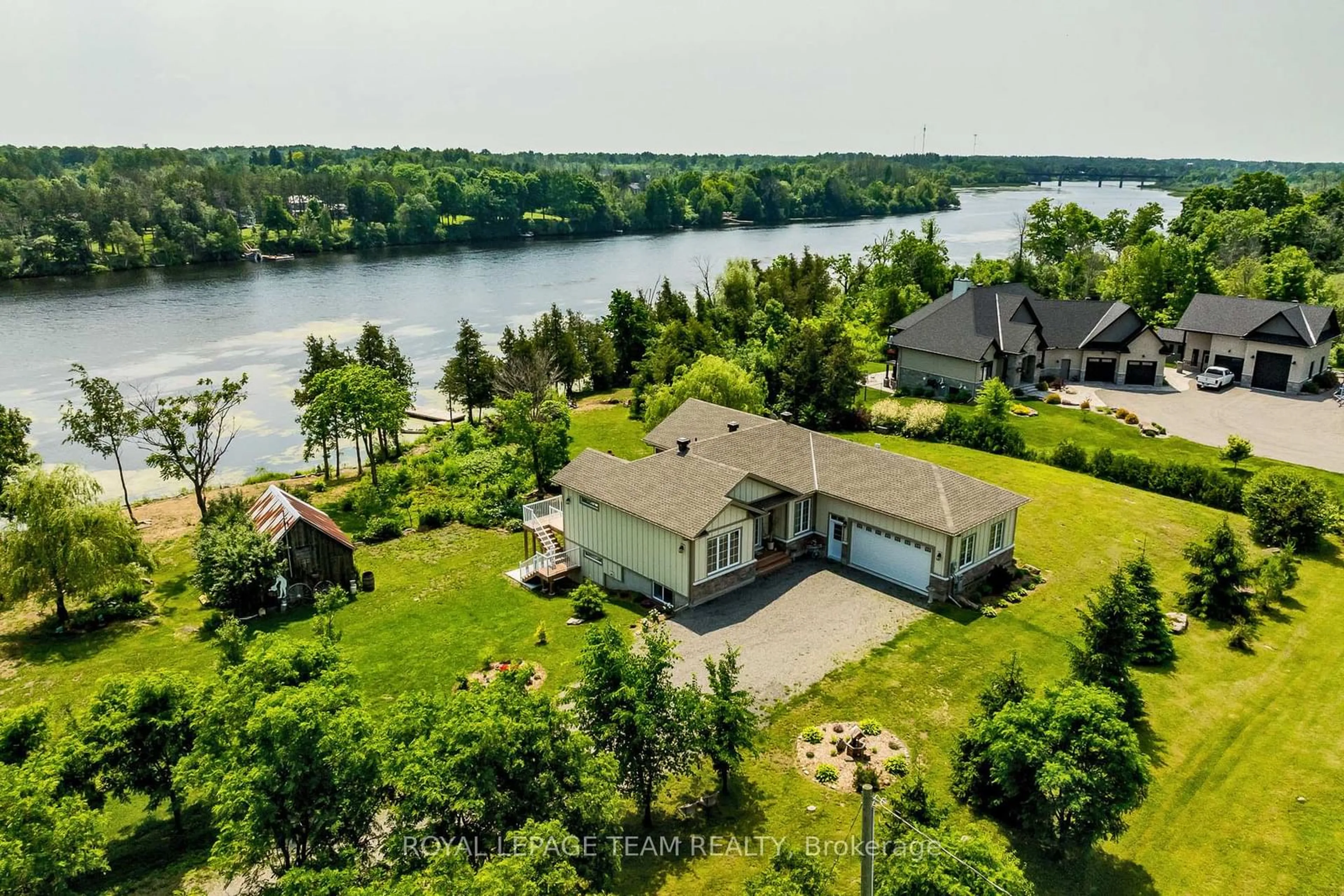 A pic from outside/outdoor area/front of a property/back of a property/a pic from drone, water/lake/river/ocean view for 853 Heritage Dr, Merrickville Ontario K0G 1N0