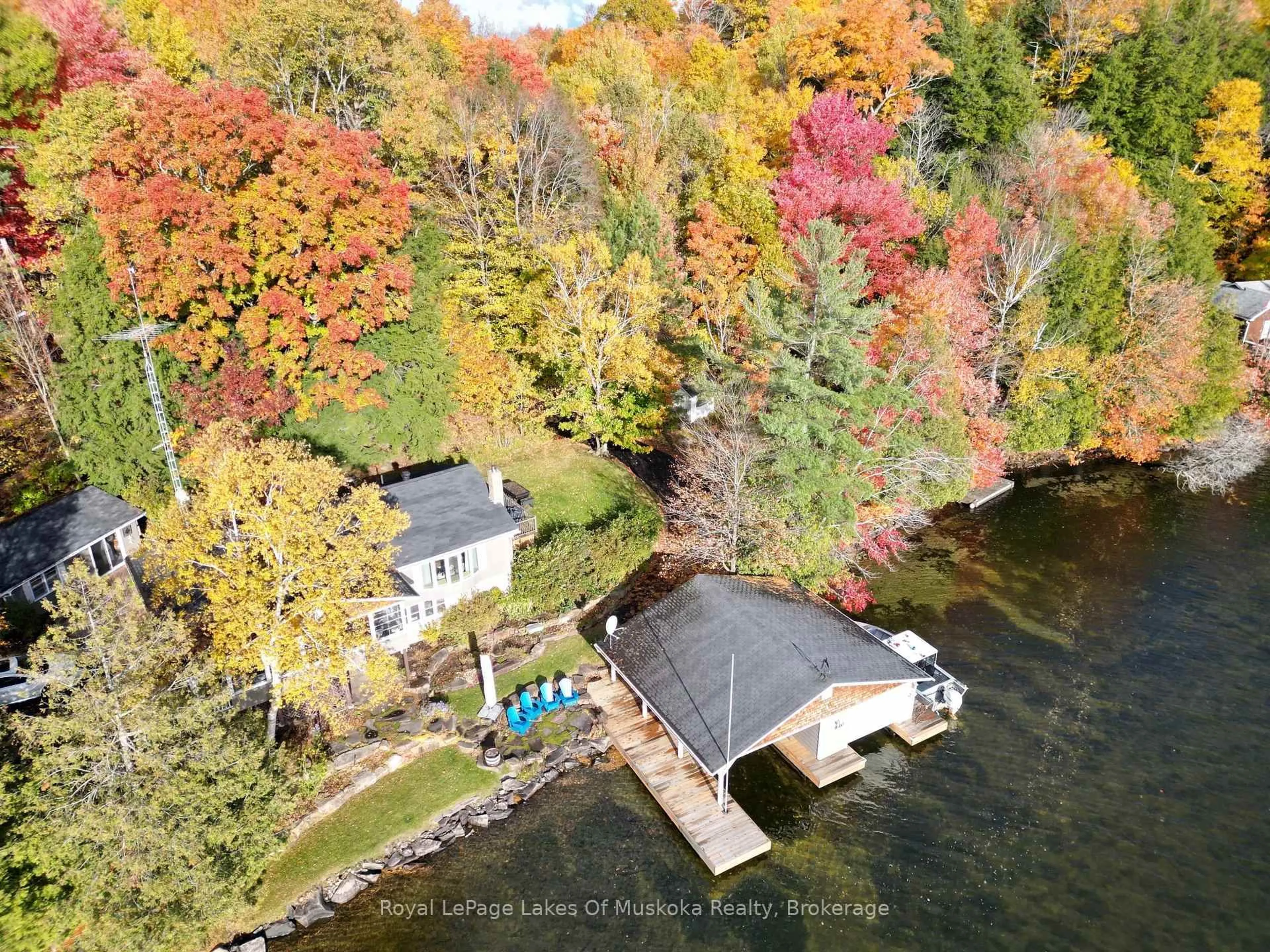 A pic from outside/outdoor area/front of a property/back of a property/a pic from drone, water/lake/river/ocean view for 1027 Old Bridge Rd #4, Muskoka Lakes Ontario P0B 1J0