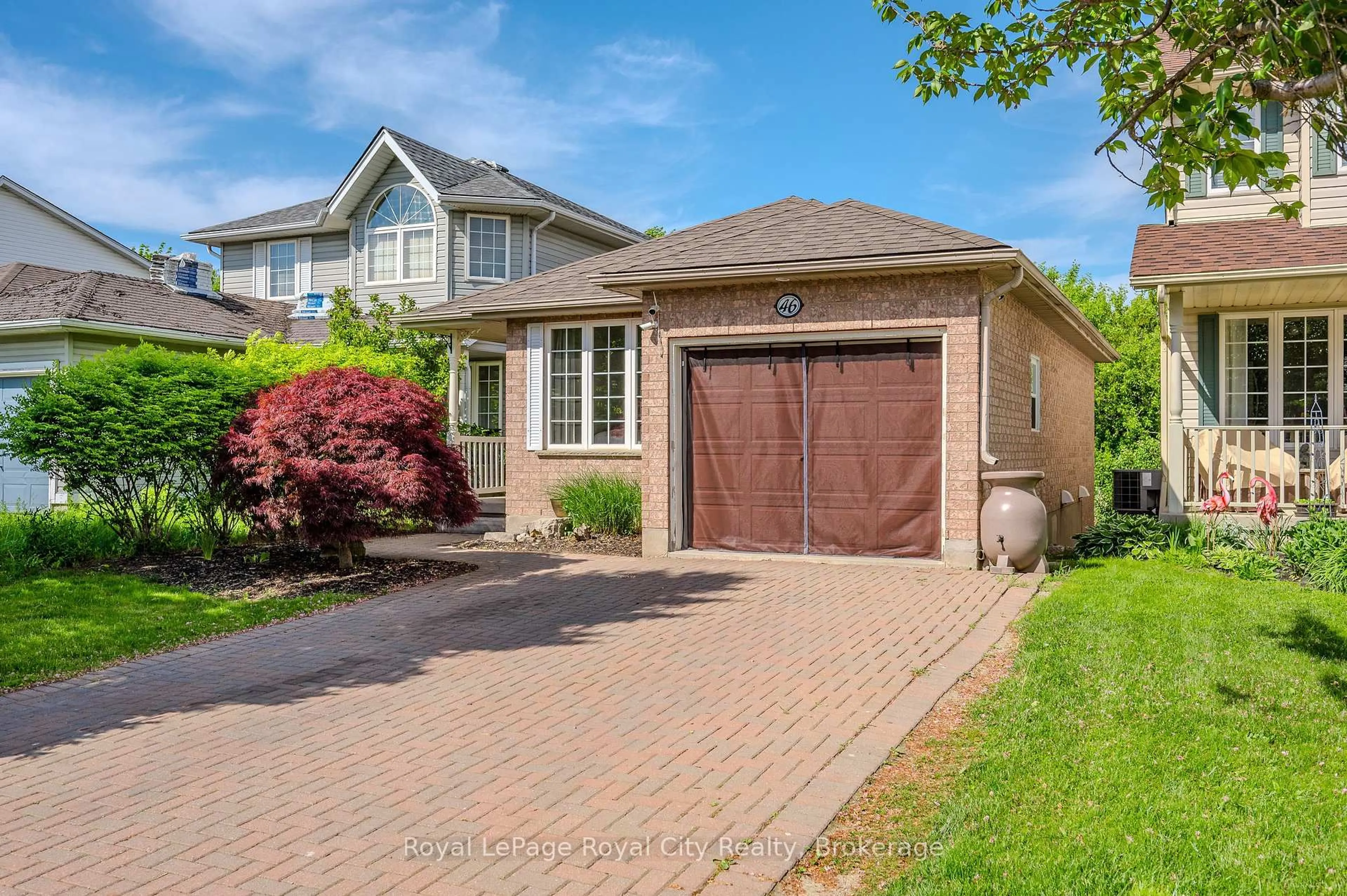 Home with brick exterior material, street for 46 FLETCHER Crt, Guelph Ontario N1E 7G8