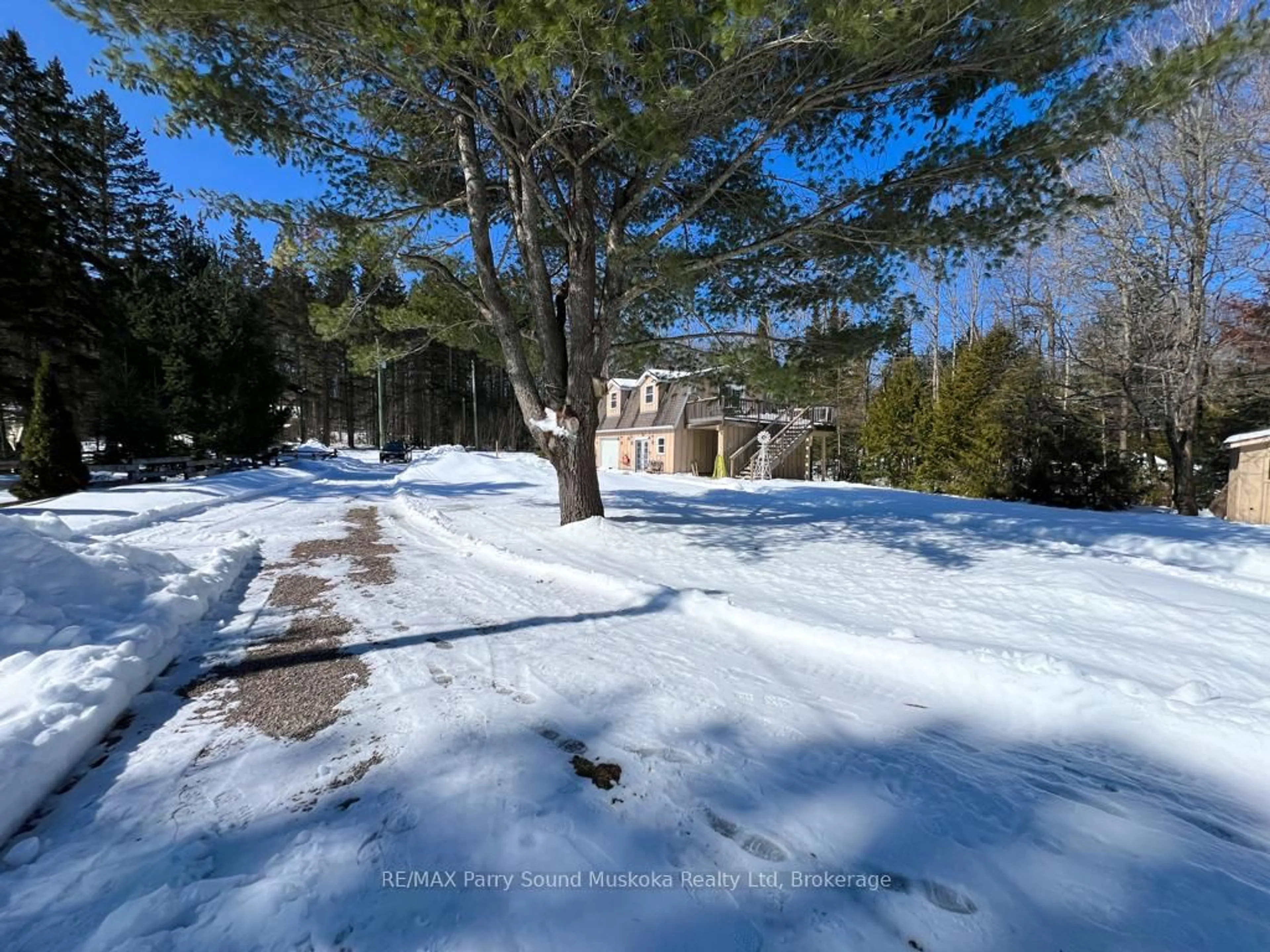 A pic from outside/outdoor area/front of a property/back of a property/a pic from drone, forest/trees view for 97 Farleys Rd, Whitestone Ontario P0A 1G0