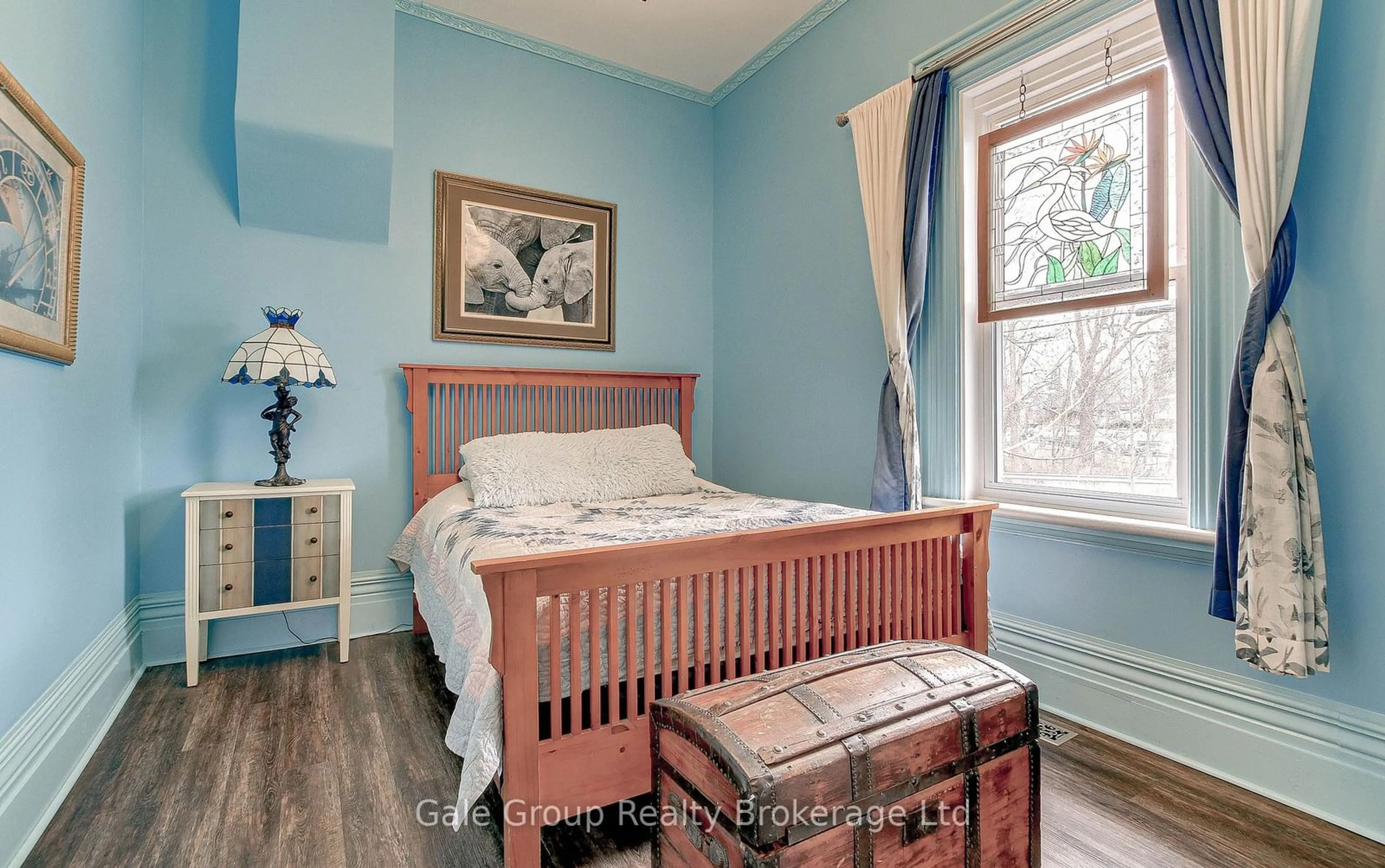 Bedroom with bed, wood/laminate floor for 5 Hull Rd, Strathroy-Caradoc Ontario N7G 2B7