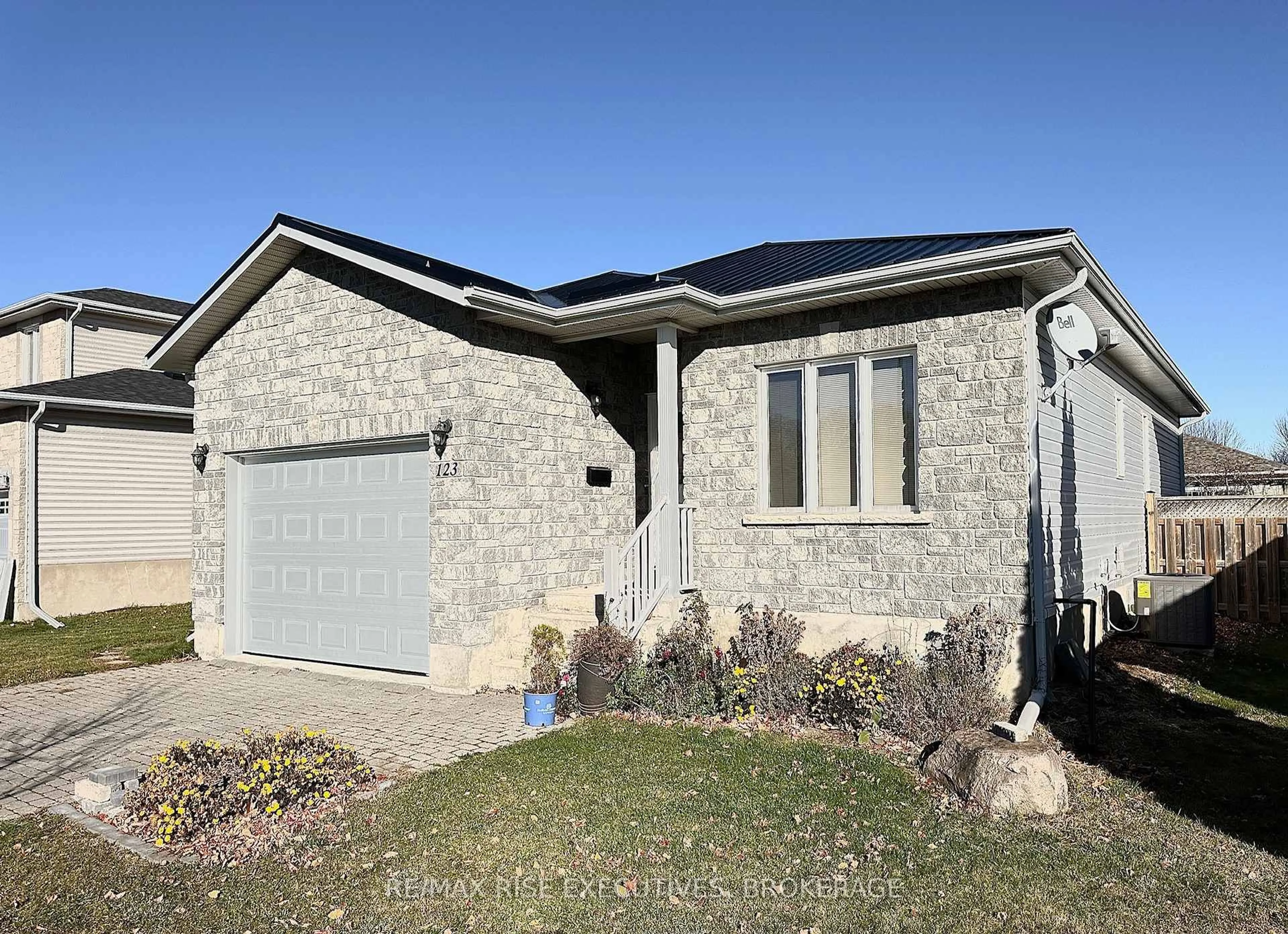 Home with brick exterior material, street for 123 MACDOUGALL Dr, Loyalist Ontario K7N 0A2