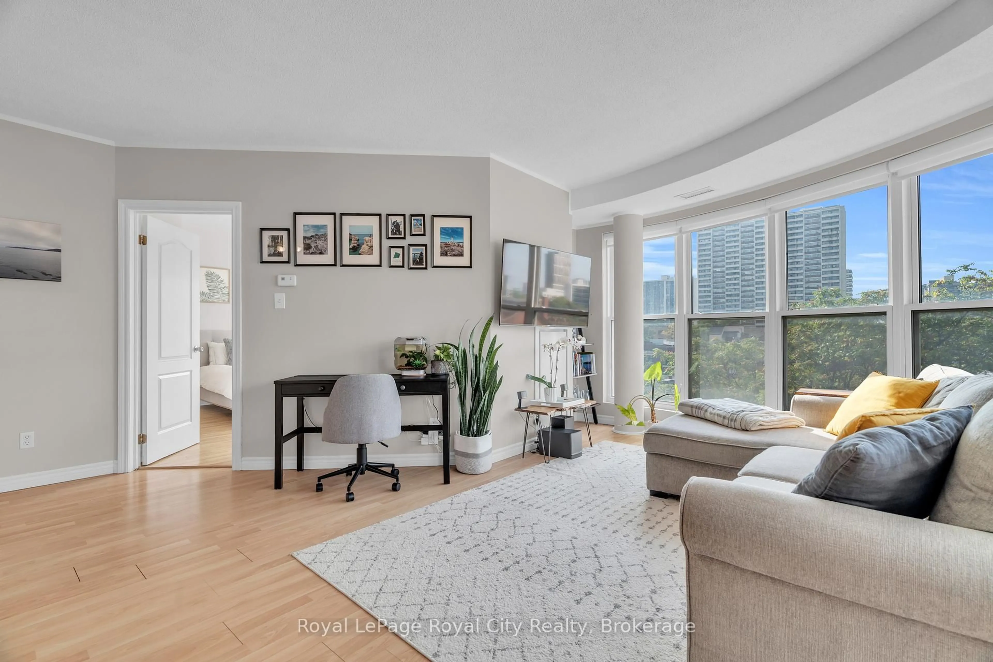 Living room with furniture, unknown for 135 James St #614, Hamilton Ontario L8P 2Z6