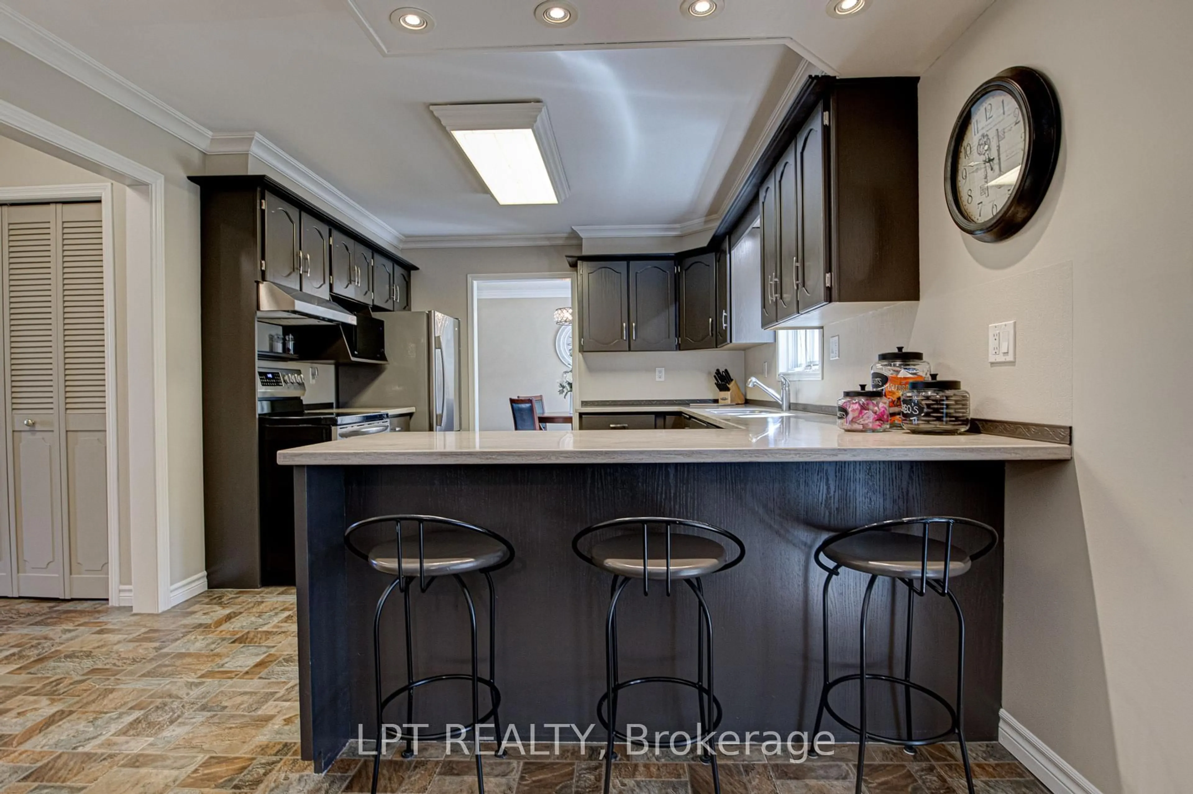 Open concept kitchen, ceramic/tile floor for 213 Bruder Crt, Centre Wellington Ontario N0B 1B0
