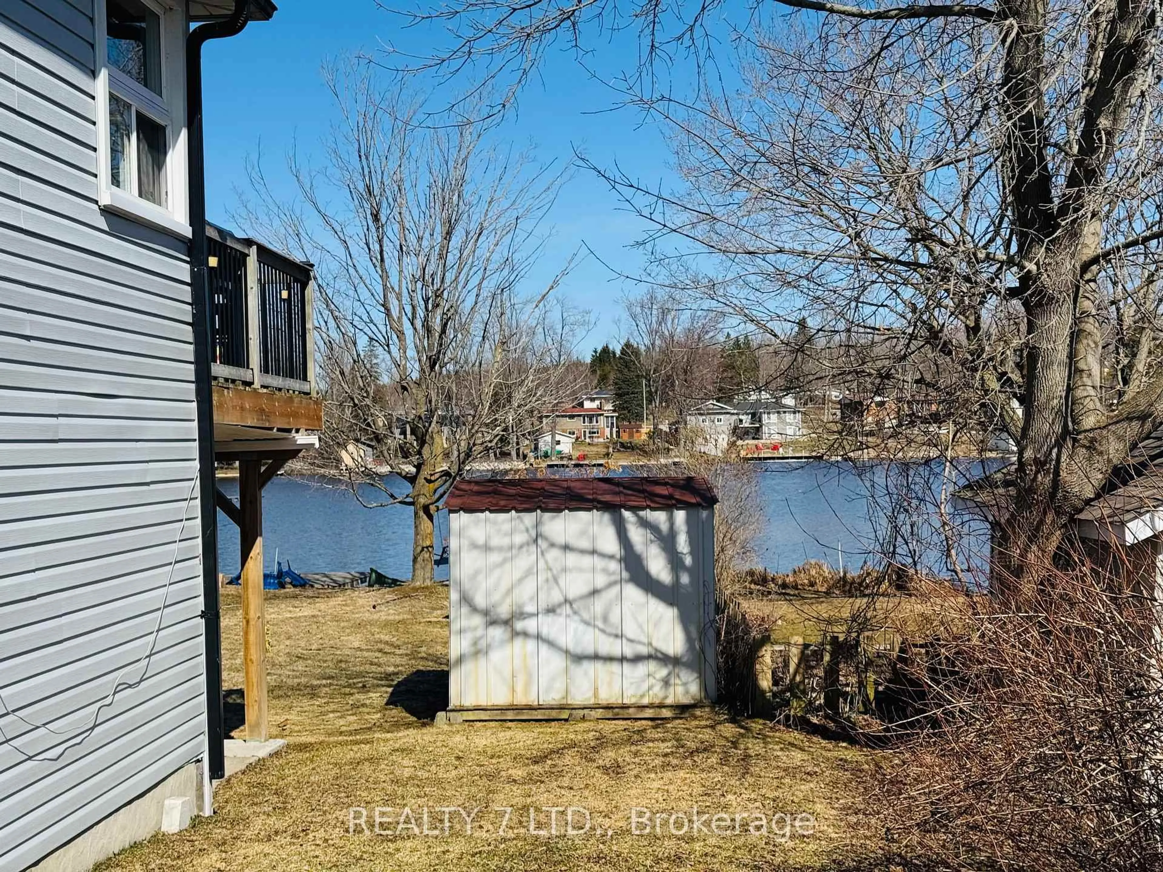 A pic from outside/outdoor area/front of a property/back of a property/a pic from drone, water/lake/river/ocean view for 22 LAWRENCE St, Kawartha Lakes Ontario K9J 6X3