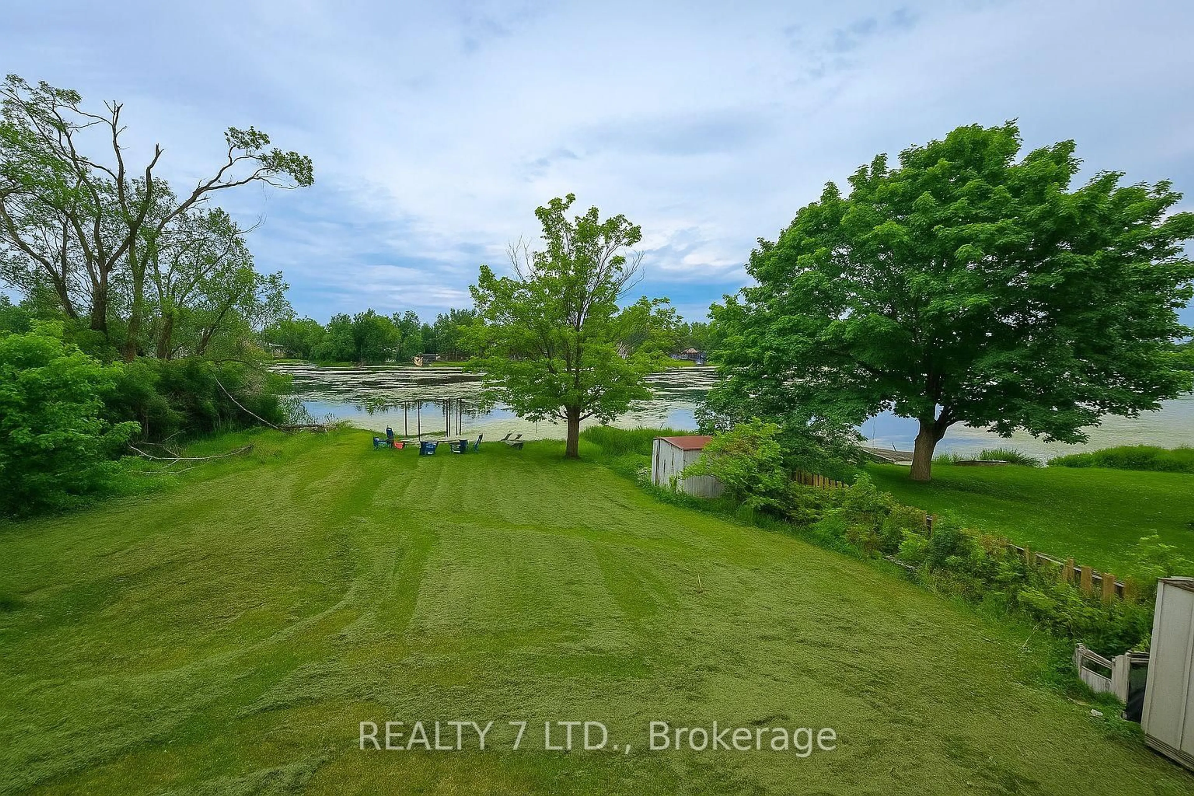 A pic from outside/outdoor area/front of a property/back of a property/a pic from drone, water/lake/river/ocean view for 22 LAWRENCE St, Kawartha Lakes Ontario K9J 6X3