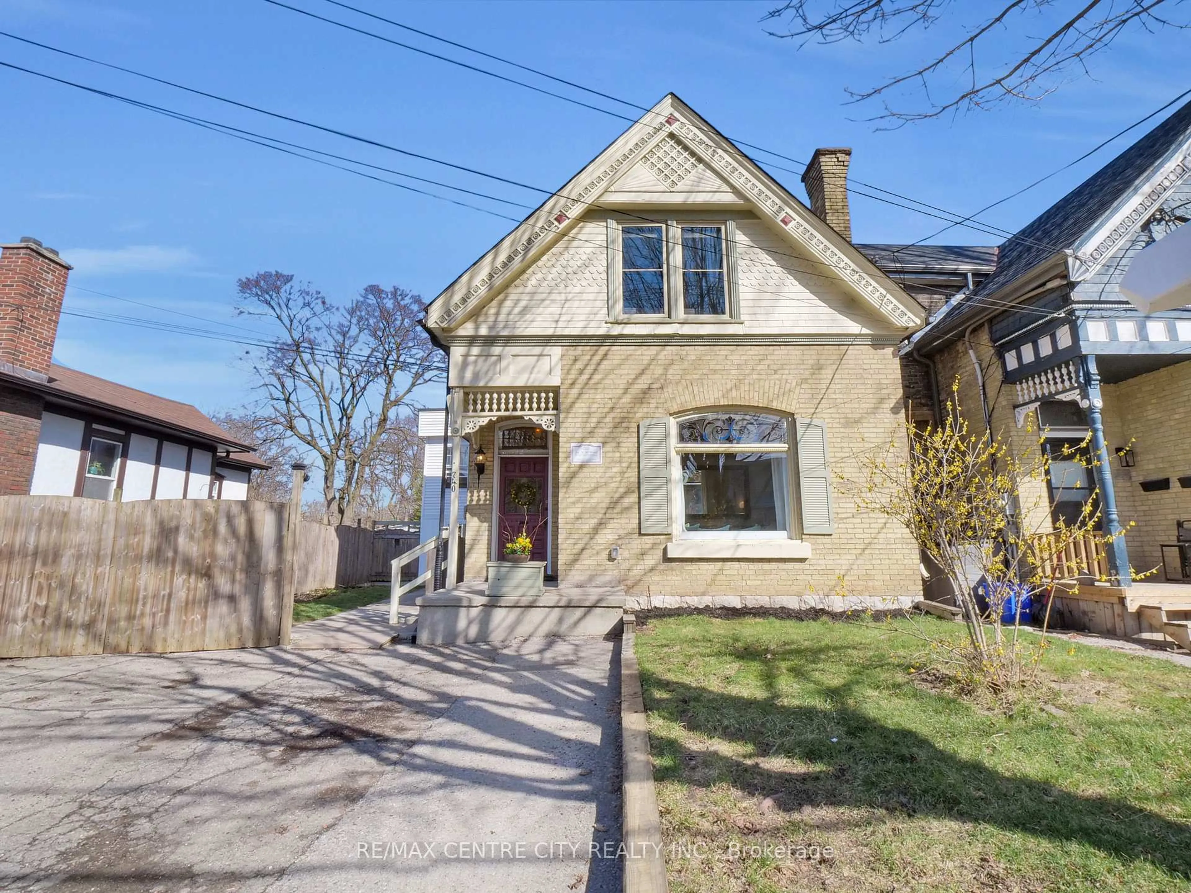 Home with brick exterior material, street for 740 Queens Ave, London Ontario N5W 3H5