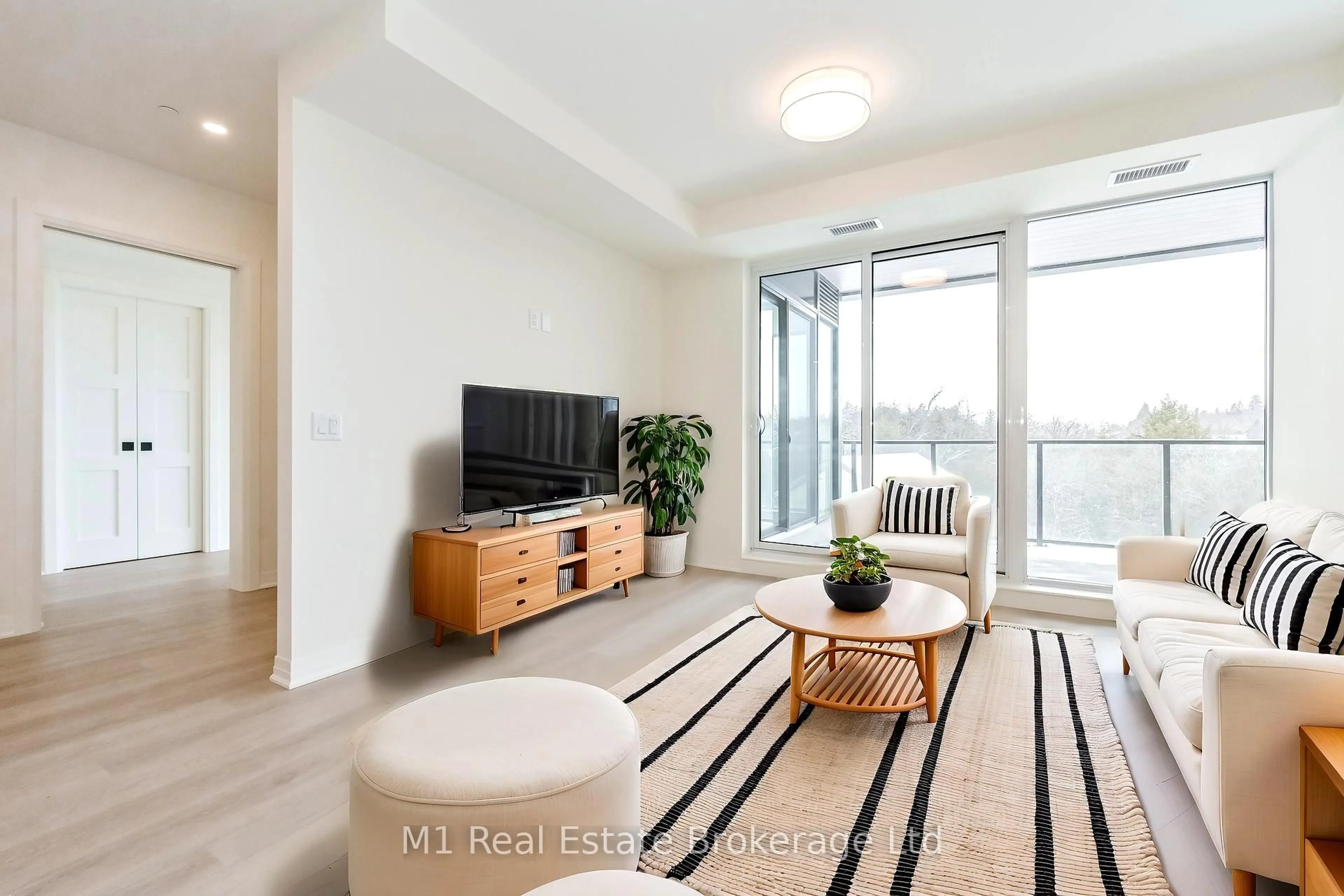 Living room with furniture, unknown for 6523 Wellington 7 Rd #402, Centre Wellington Ontario N0B 1S0