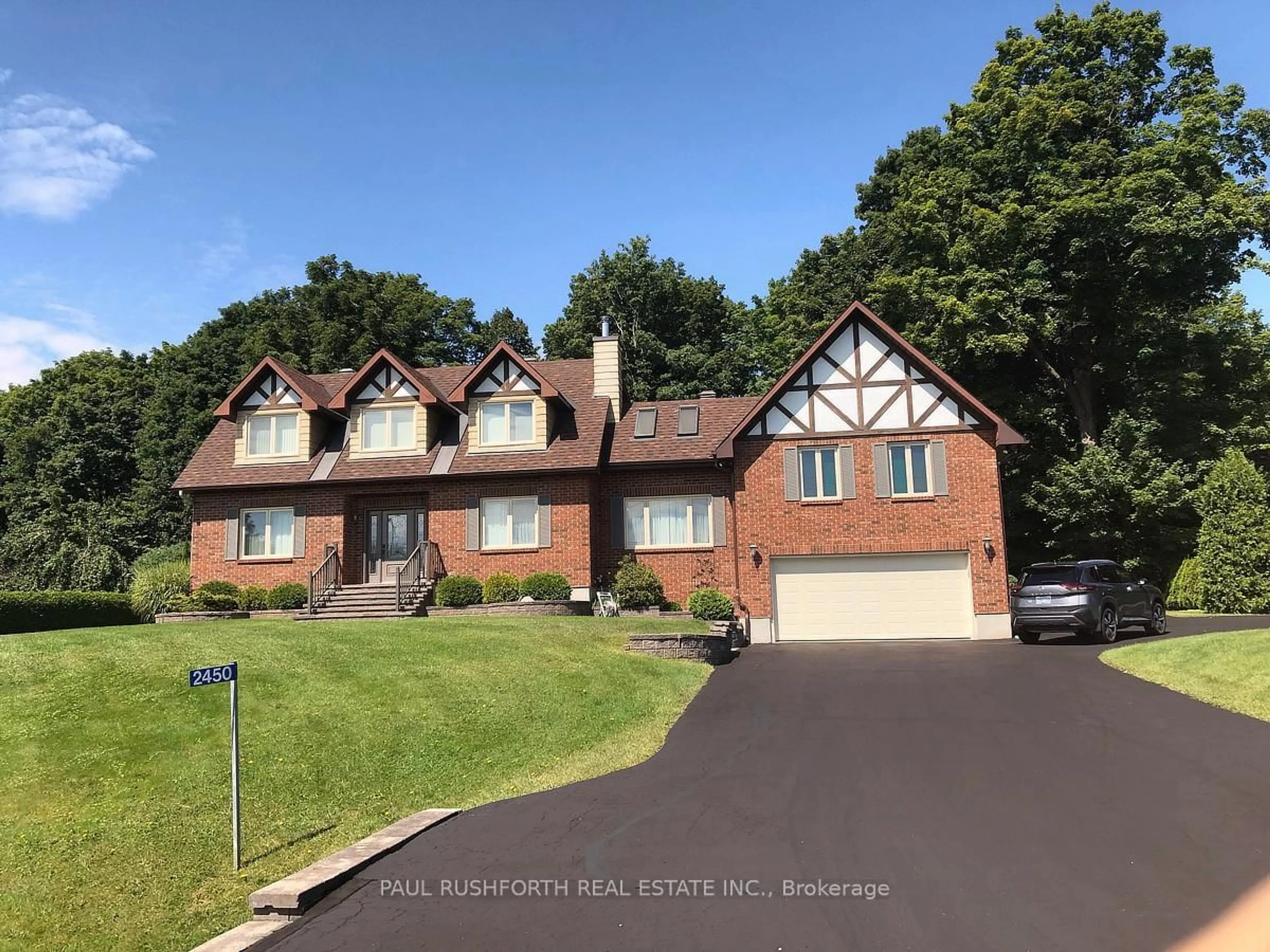 Home with brick exterior material, street for 2450 Lookout Dr, Cumberland Ontario K4C 1B7
