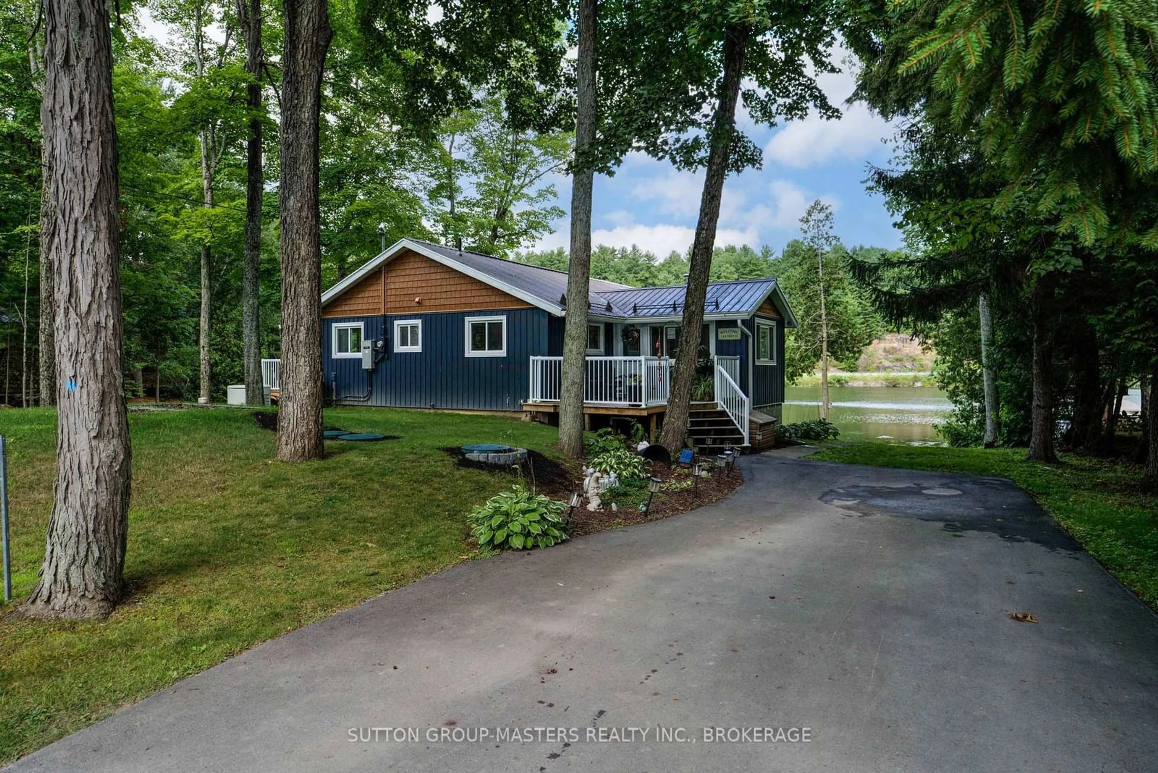 A pic from outside/outdoor area/front of a property/back of a property/a pic from drone, water/lake/river/ocean view for 104 Killenbeck Lane, Leeds and the Thousand Islands Ontario K0E 1L0