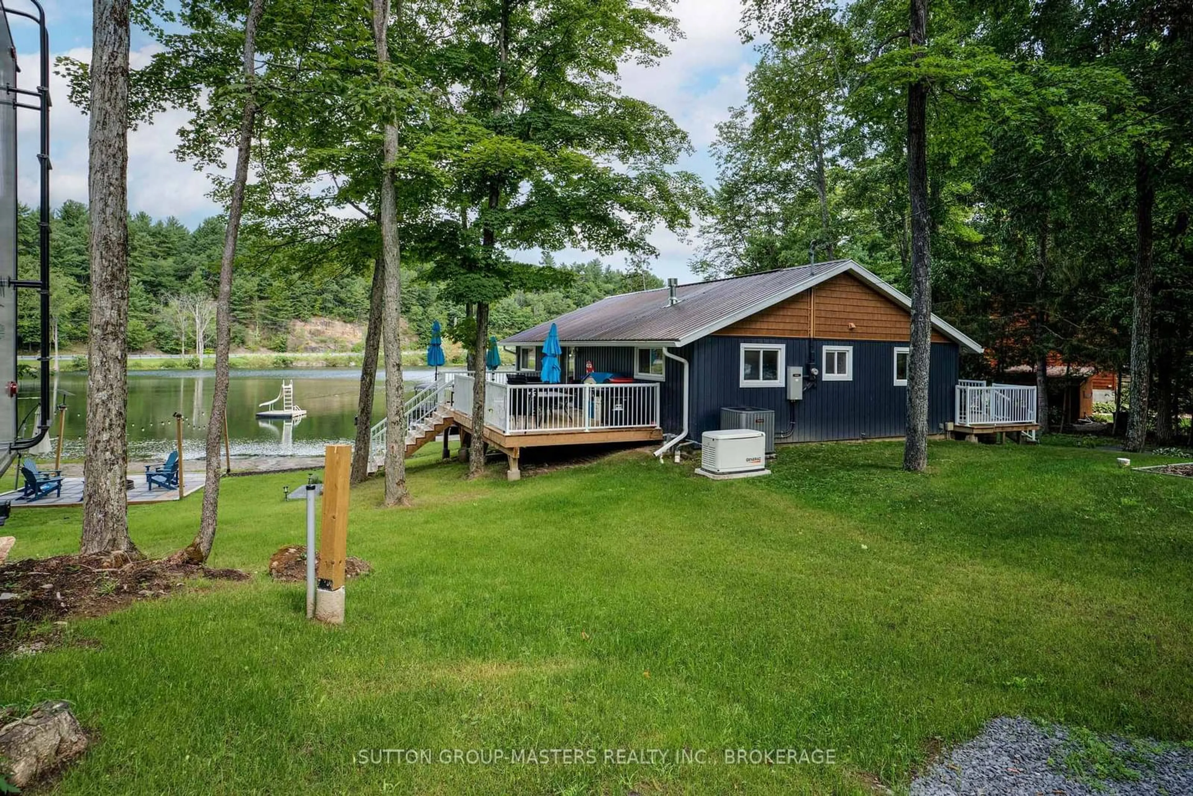 A pic from outside/outdoor area/front of a property/back of a property/a pic from drone, water/lake/river/ocean view for 104 Killenbeck Lane, Leeds and the Thousand Islands Ontario K0E 1L0