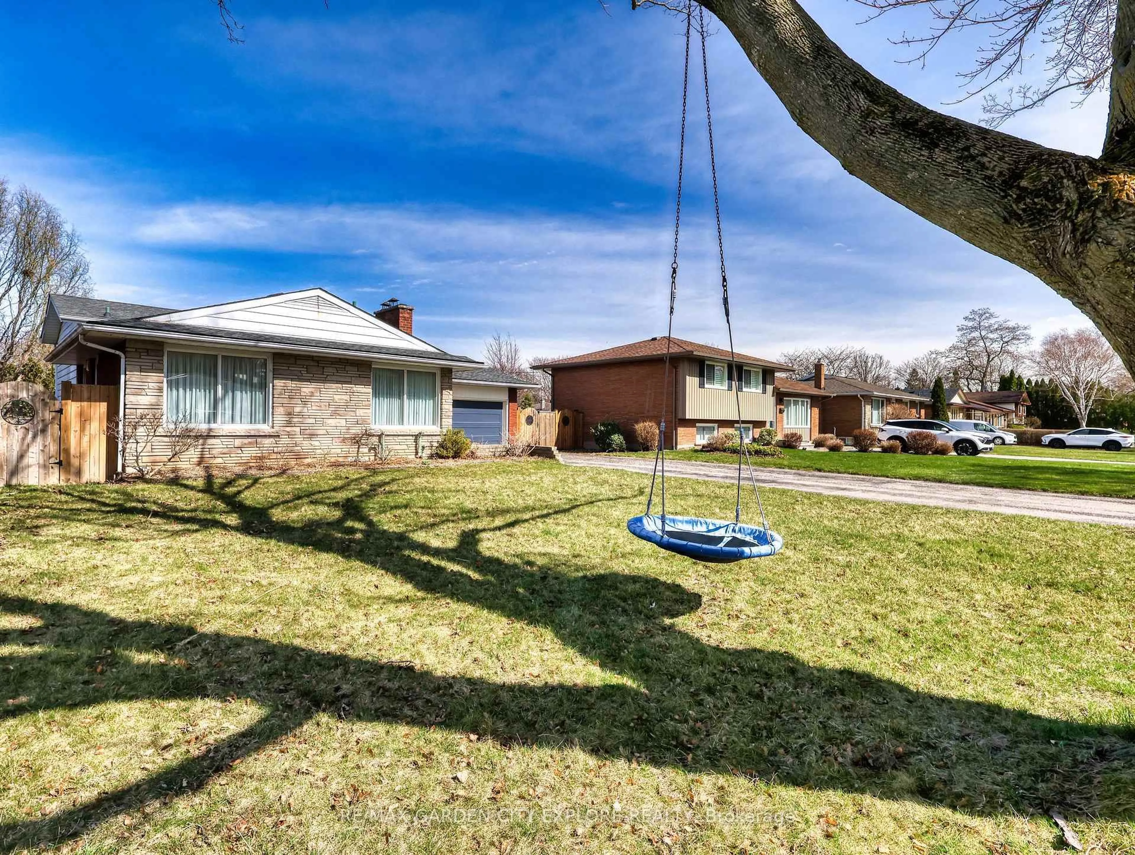 A pic from outside/outdoor area/front of a property/back of a property/a pic from drone, street for 12 Frontenac Dr, St. Catharines Ontario L2M 2E2