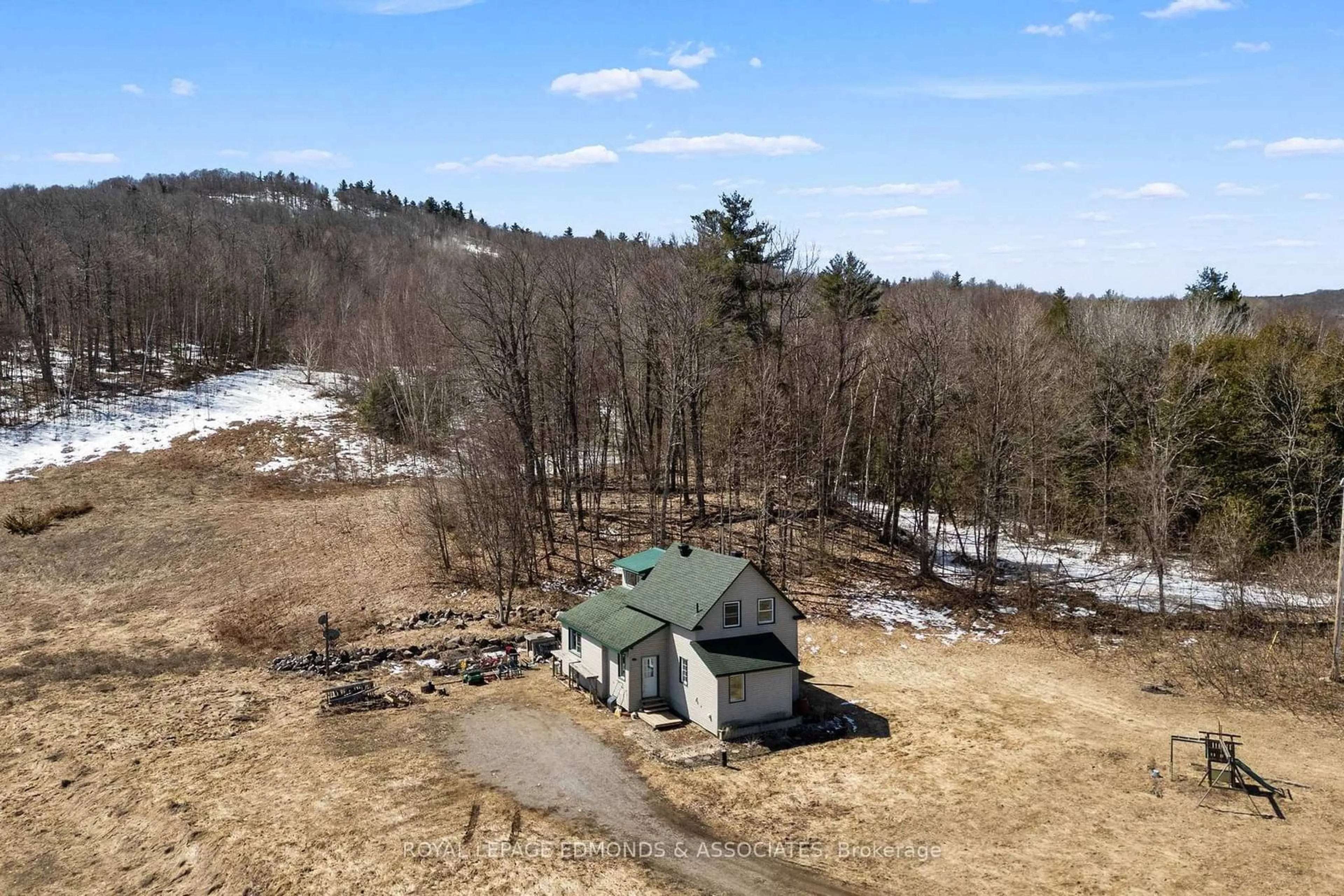 A pic from outside/outdoor area/front of a property/back of a property/a pic from drone, mountain view for 887 Flat Rd, Dacre Ontario K0J 1N0