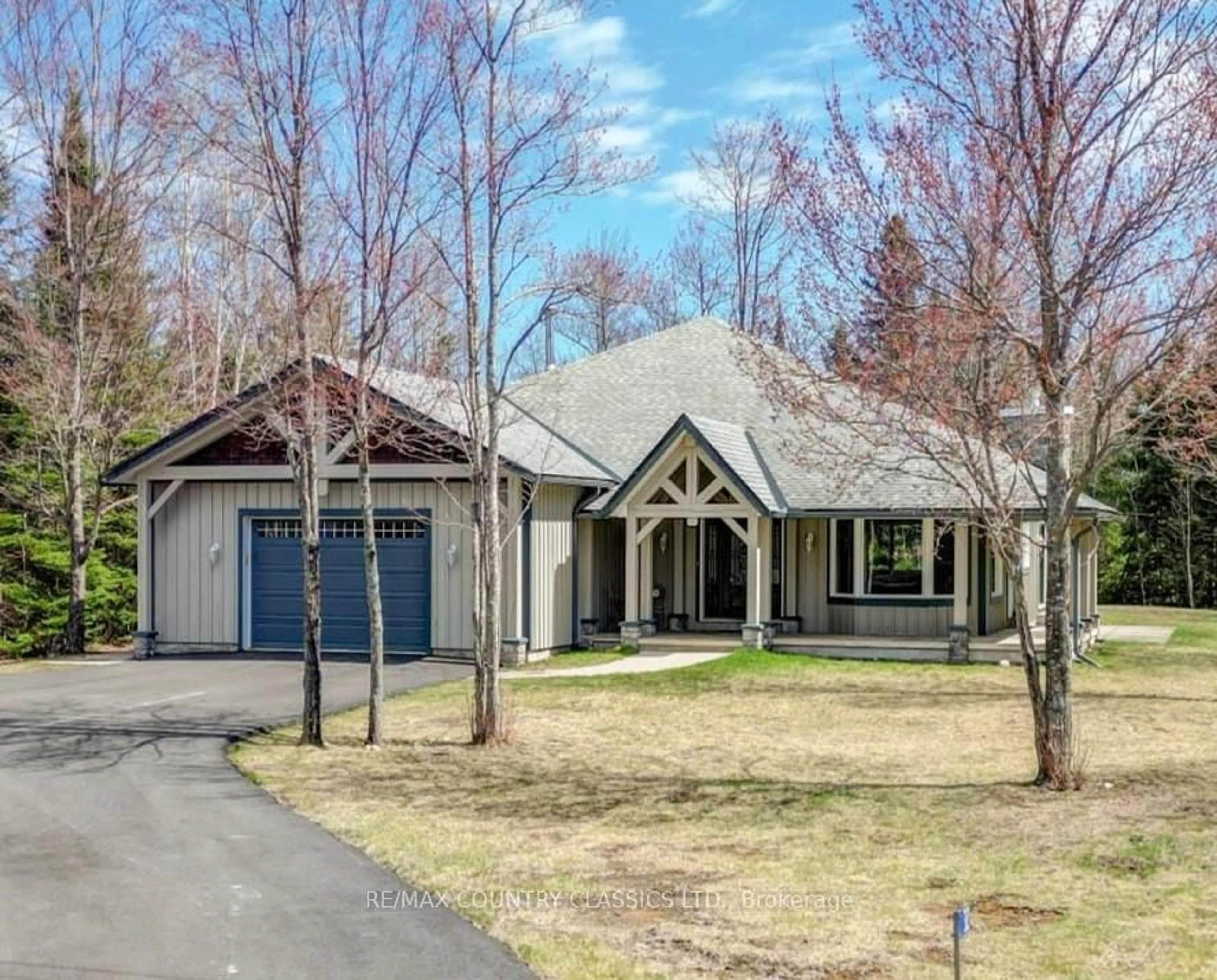 Home with brick exterior material, street for 32 Nicklaus Dr, Bancroft Ontario K0L 1C0