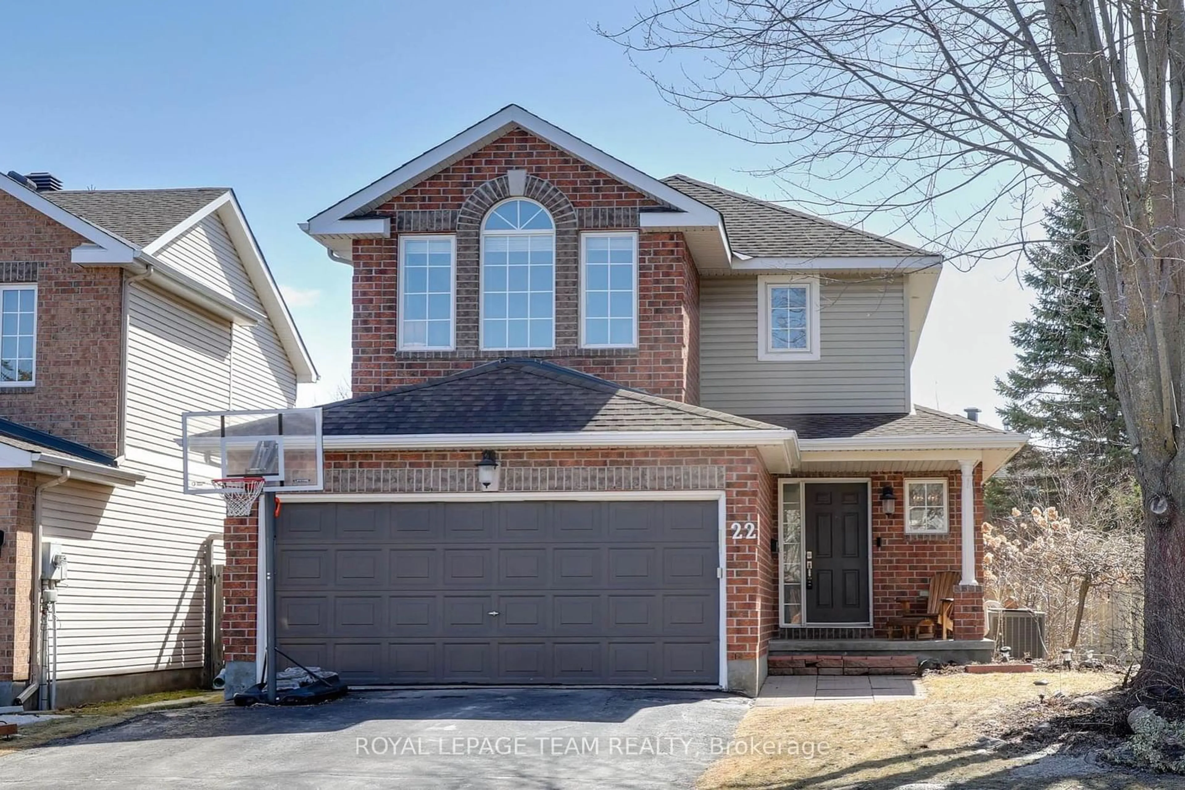 Home with brick exterior material, street for 22 SHERRING Cres, Ottawa Ontario K2K 2T2