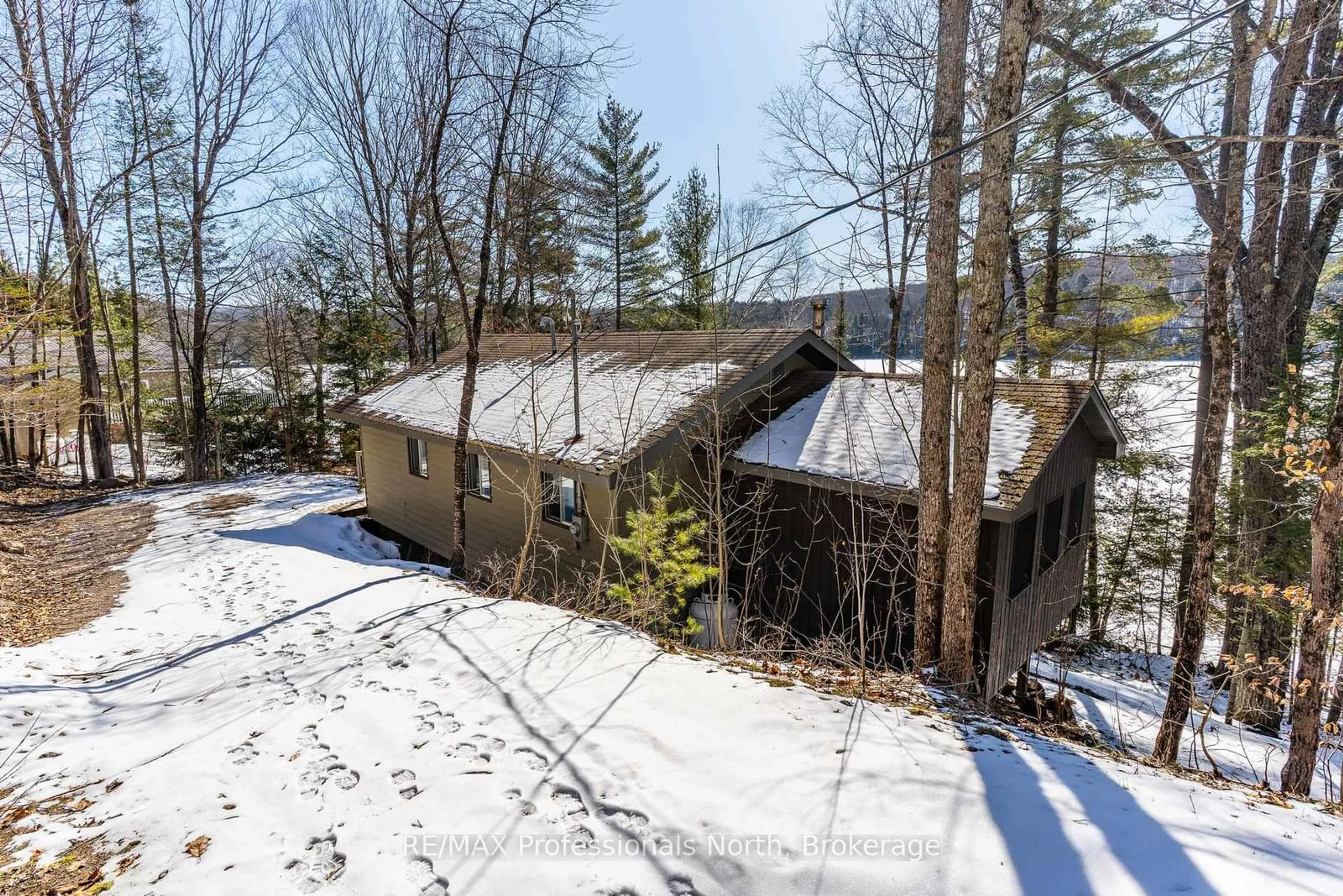 A pic from outside/outdoor area/front of a property/back of a property/a pic from drone, unknown for 1196 Portage Rd, Dysart et al Ontario K0M 1S0