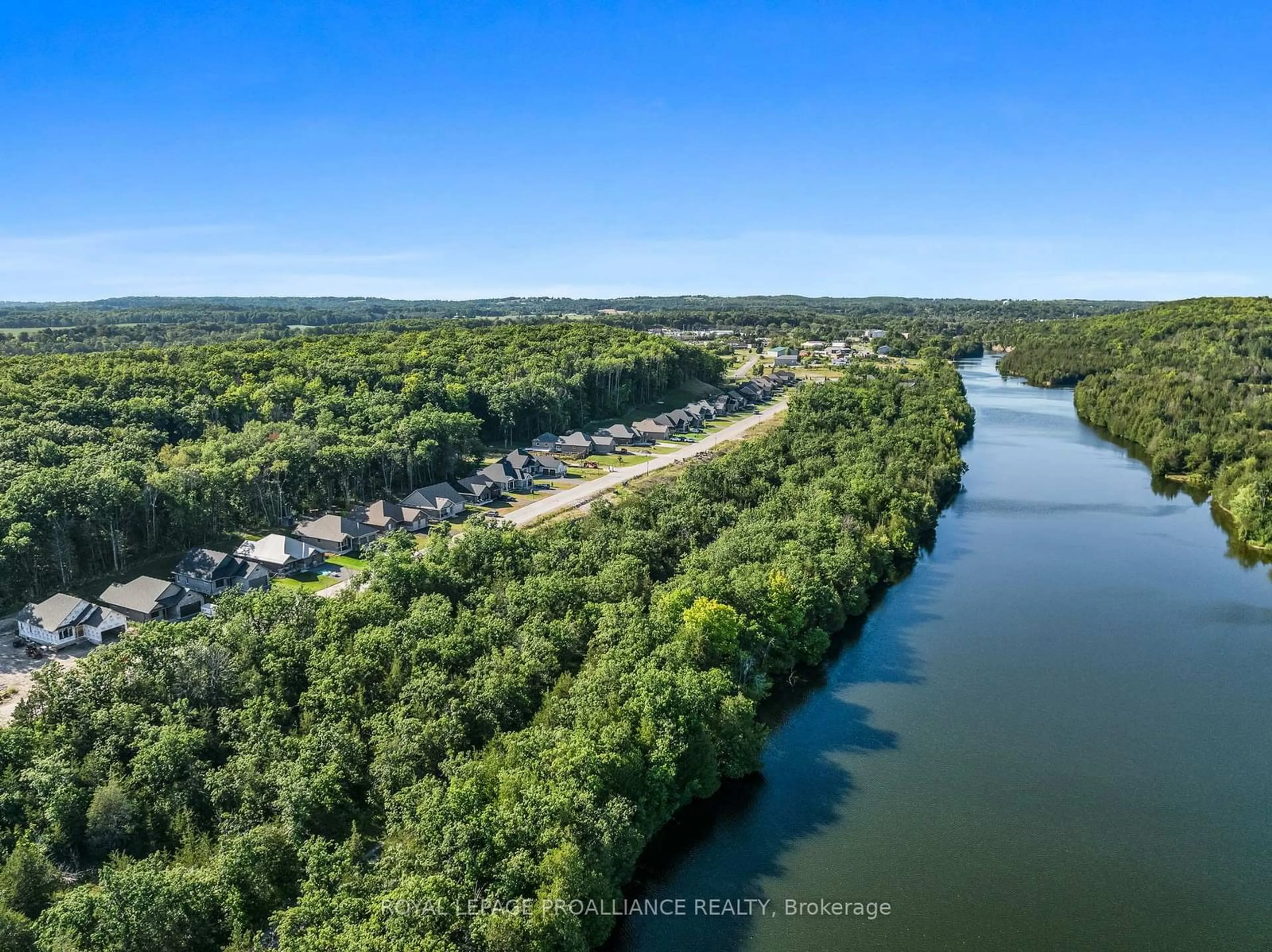 A pic from outside/outdoor area/front of a property/back of a property/a pic from drone, water/lake/river/ocean view for 38 Riverside Tr, Trent Hills Ontario K0L 1L0