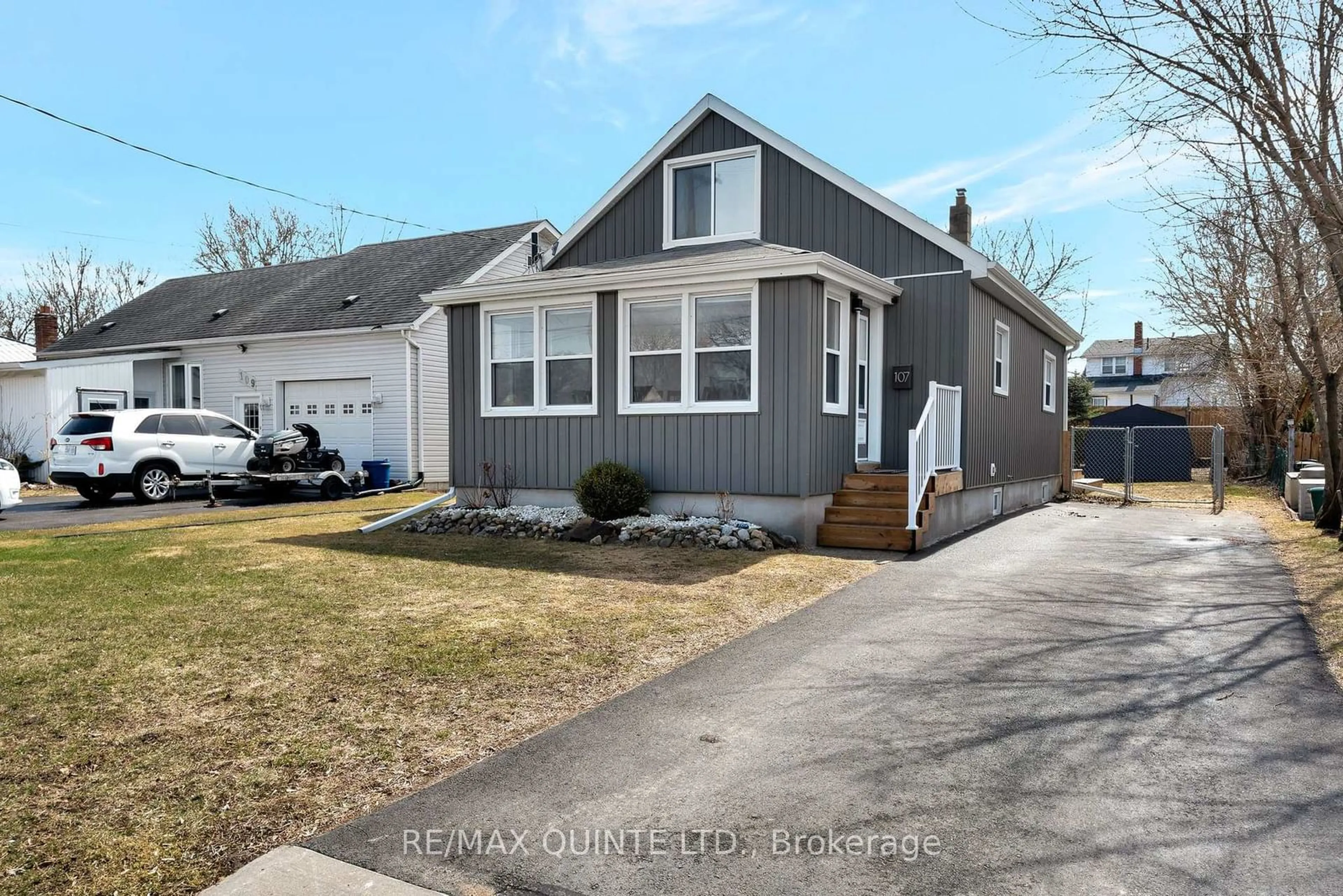 Home with vinyl exterior material, street for 107 Dixon Dr, Quinte West Ontario K8V 1W7