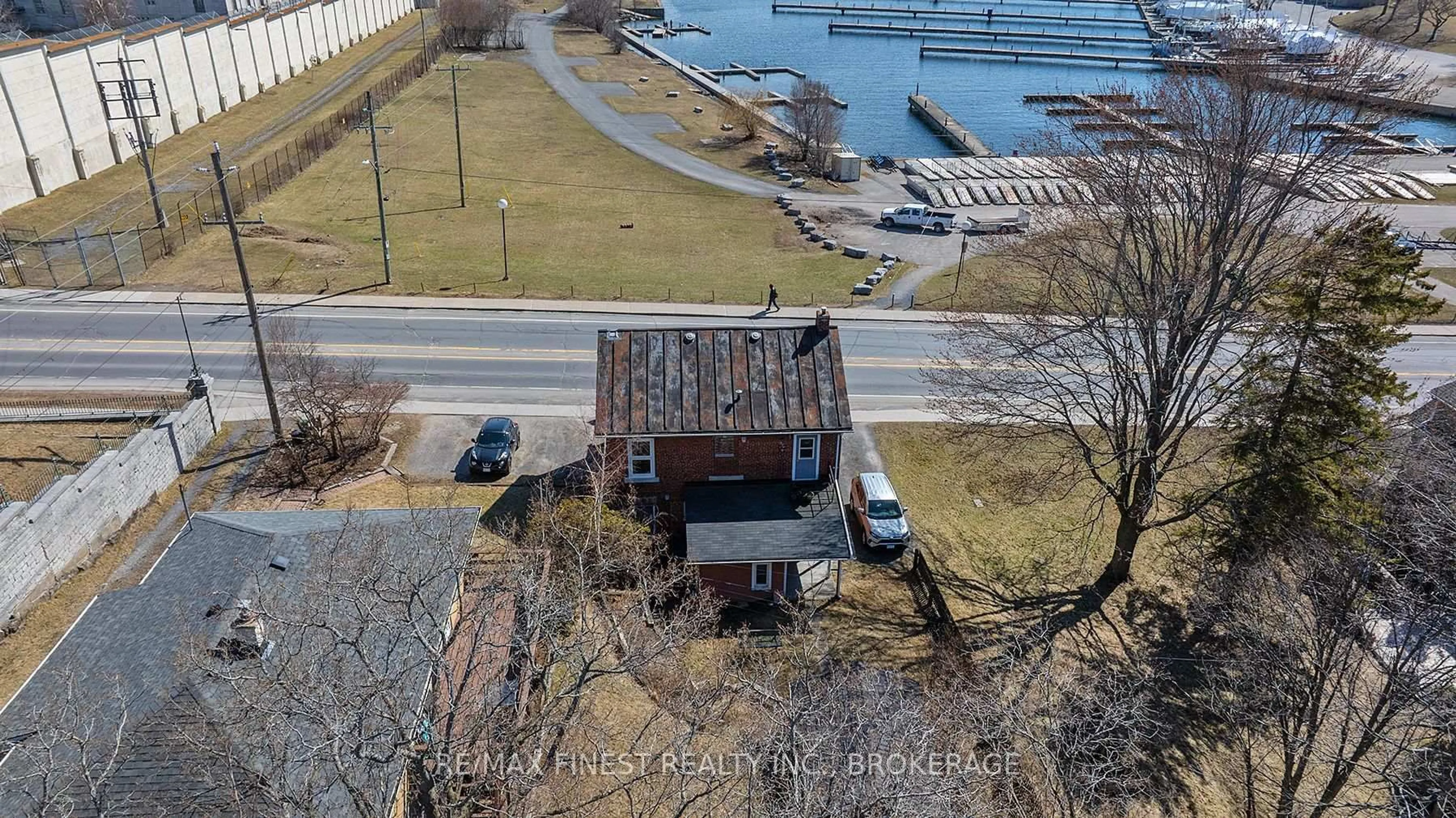 A pic from outside/outdoor area/front of a property/back of a property/a pic from drone, water/lake/river/ocean view for 589 King St, Kingston Ontario K7M 2E6